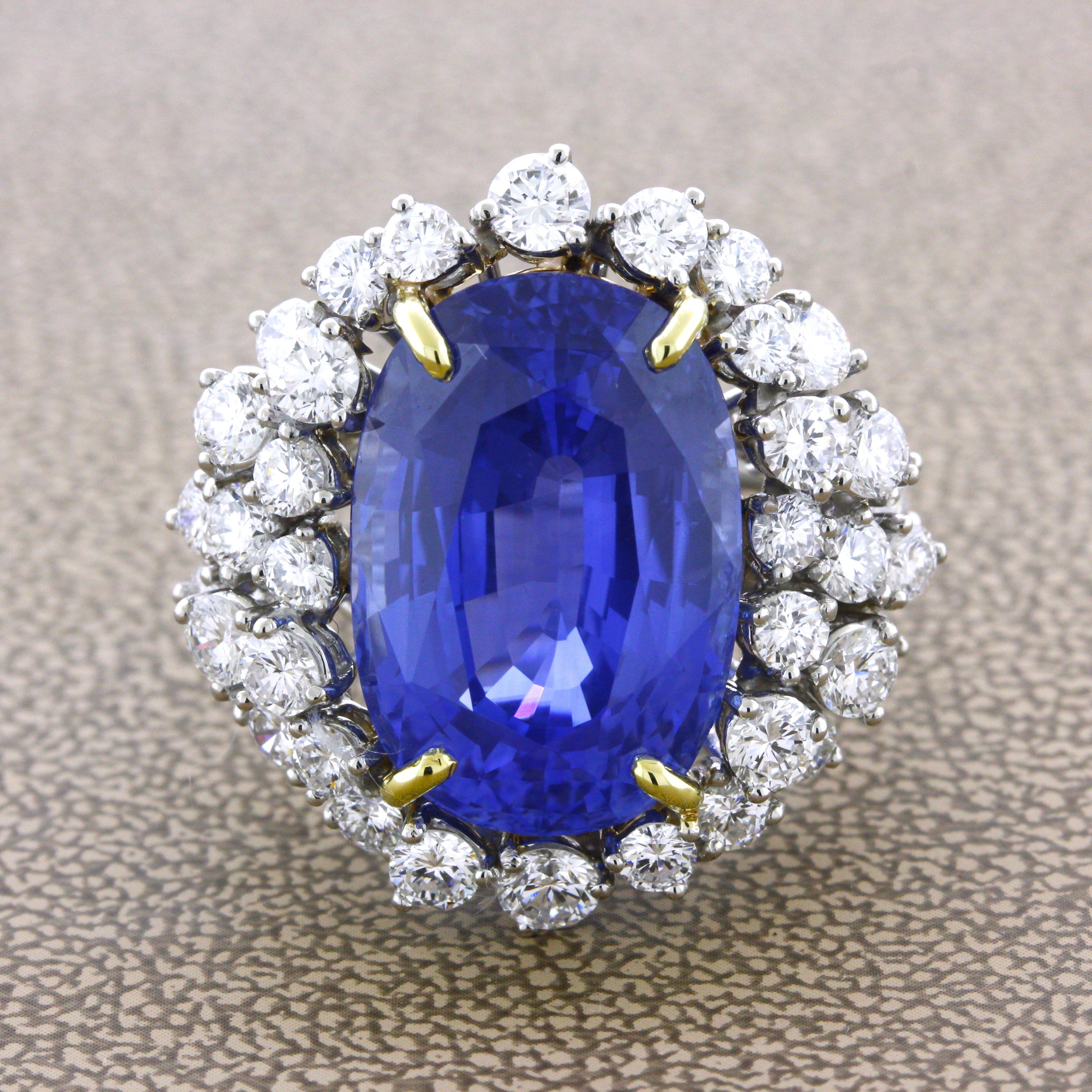 A special gemstone is set in the middle of this gorgeous platinum cocktail ring. It is a gem 20.17 carat Ceylon sapphire which has been GIA Certified. What makes this stone so special is the combination of its size, color, and clarity. It has a rich