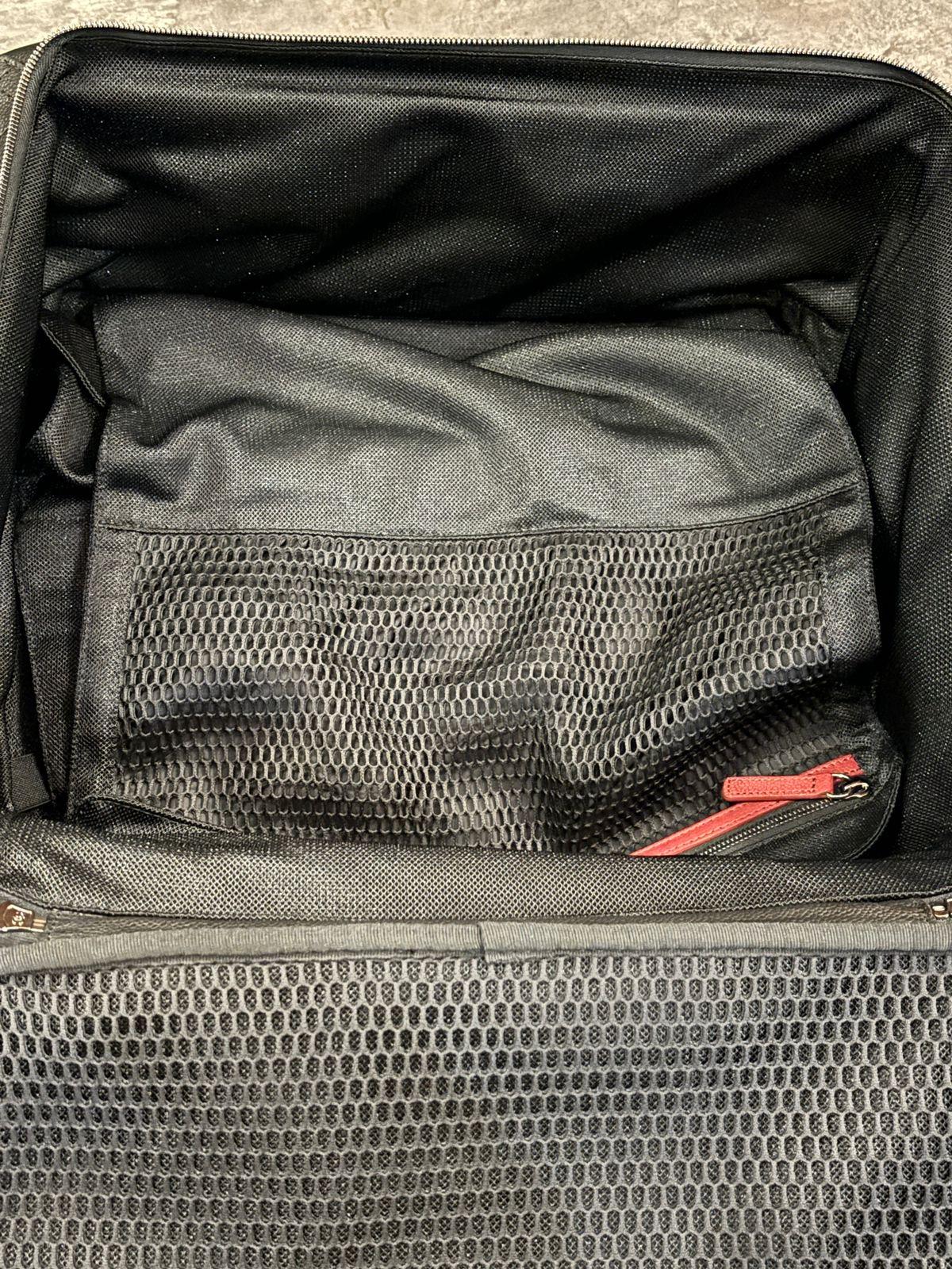 Chanel Caviar quilted black rolling cabin size luggage. Overall in very good condition, barely used. But there are some scuffing and scratching due to storage. Size 45. Comes with the luggage cover. Series #23. Comes with the holo intact, luggage