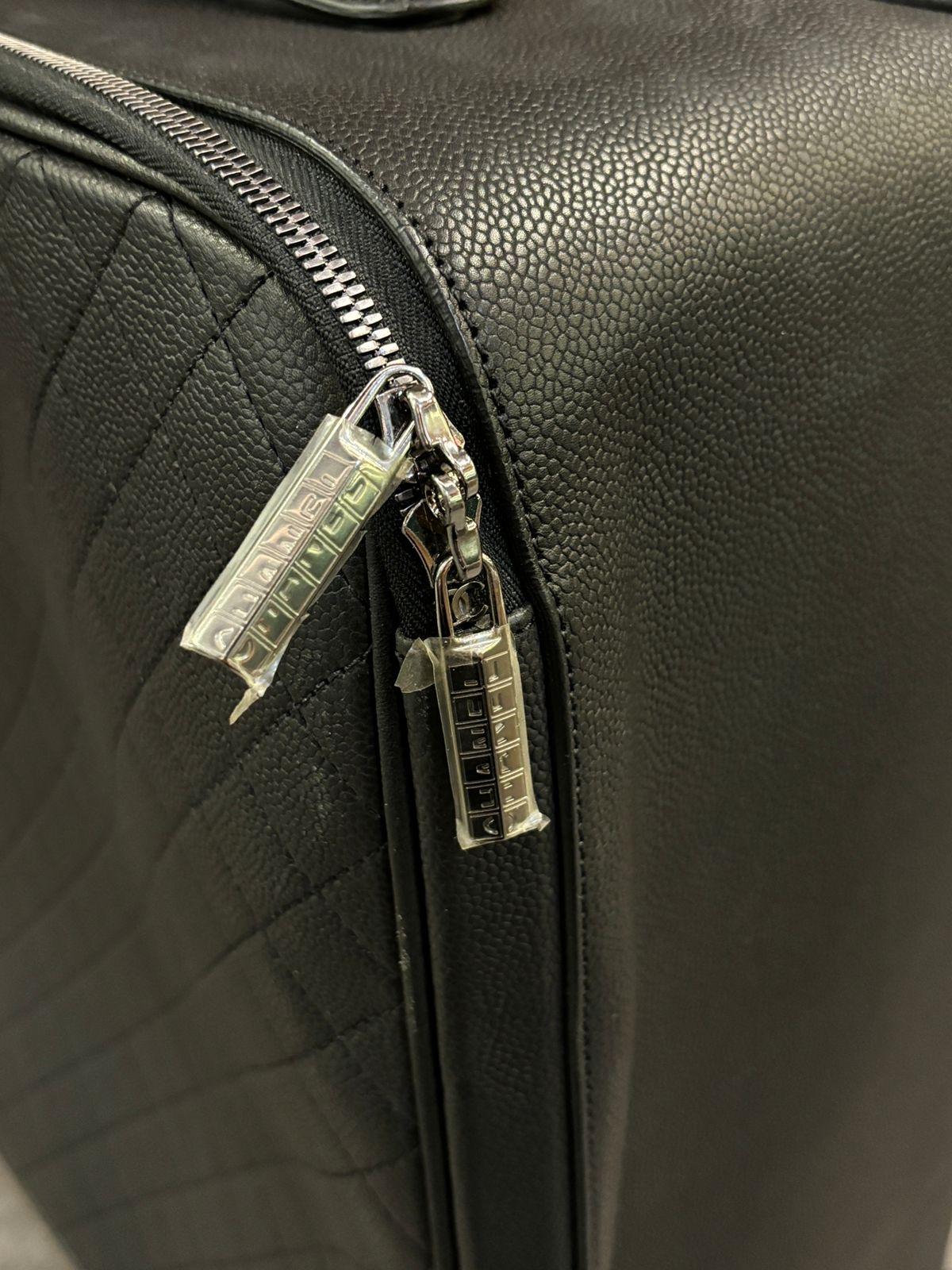 Women's or Men's 2017 Chanel Black Caviar Quilted Cabin Rolling Luggage For Sale