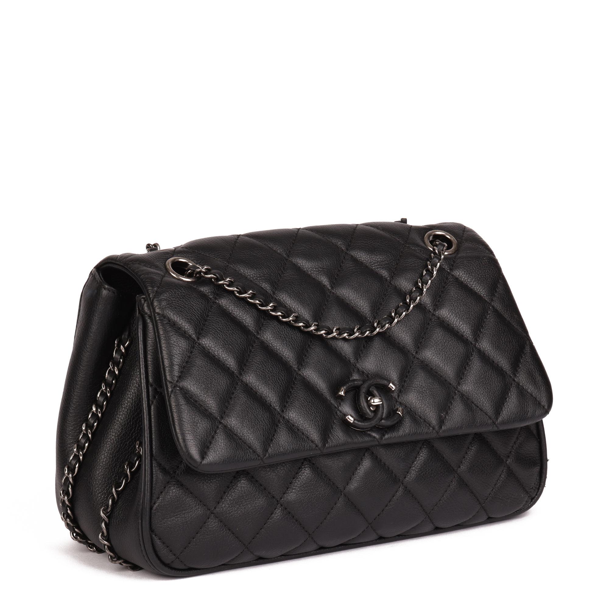 CHANEL
 Black Quilted Calfskin Leather Medium Frame in Chain Flap Bag

Xupes Reference: HB4157
Serial Number: 23252981
Age (Circa): 2017
Accompanied By: Chanel Dust Bag
Authenticity Details: Serial Sticker (Made in Italy)
Gender: Ladies
Type: