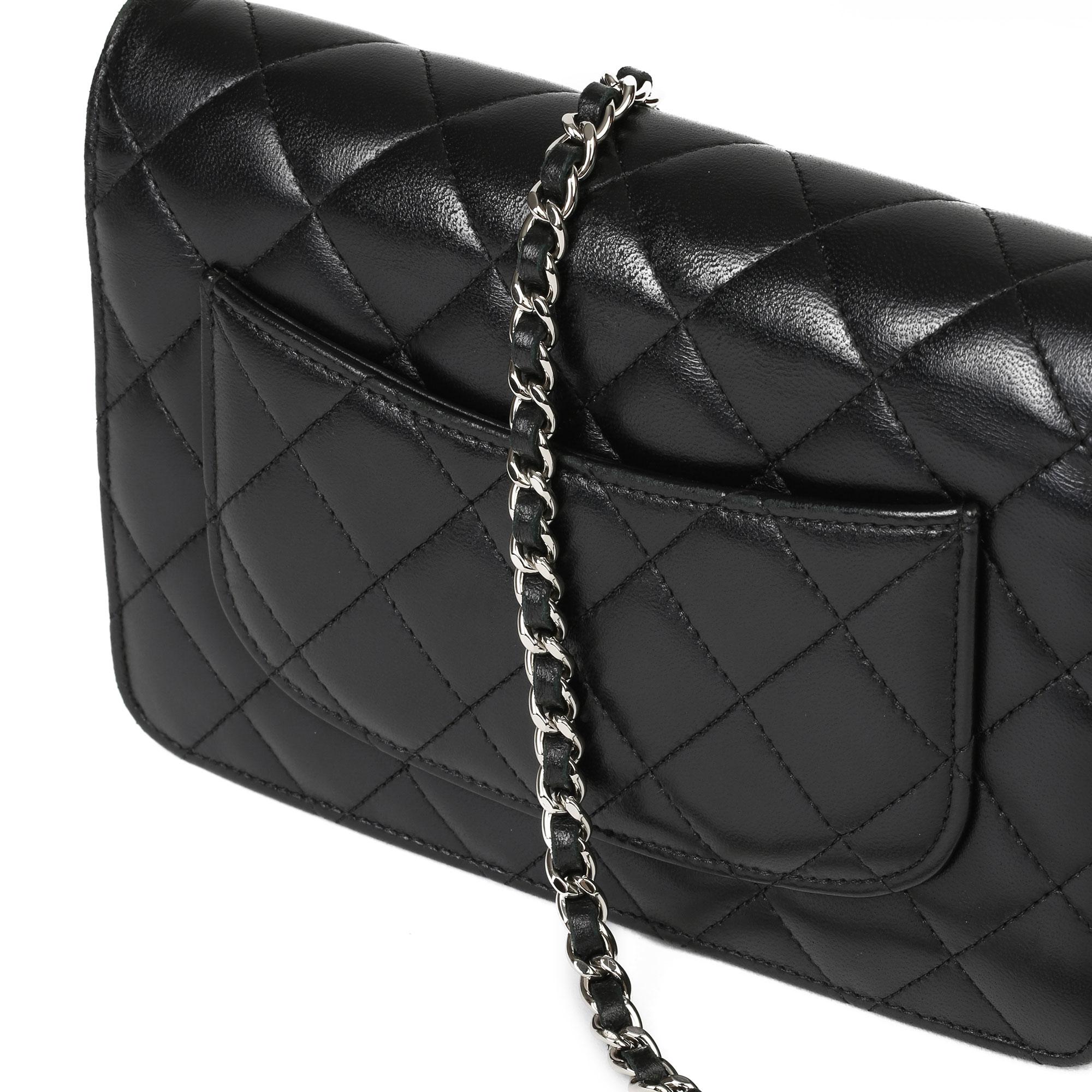 CHANEL
Black Quilted Lambskin Wallet on Chain WOC

Xupes Reference: HB3969
Serial Number: 24682425
Age (Circa): 2017
Accompanied By: Chanel Dust Bag 
Authenticity Details: Serial Sticker (Made in France)
Gender: Ladies
Type: Shoulder,