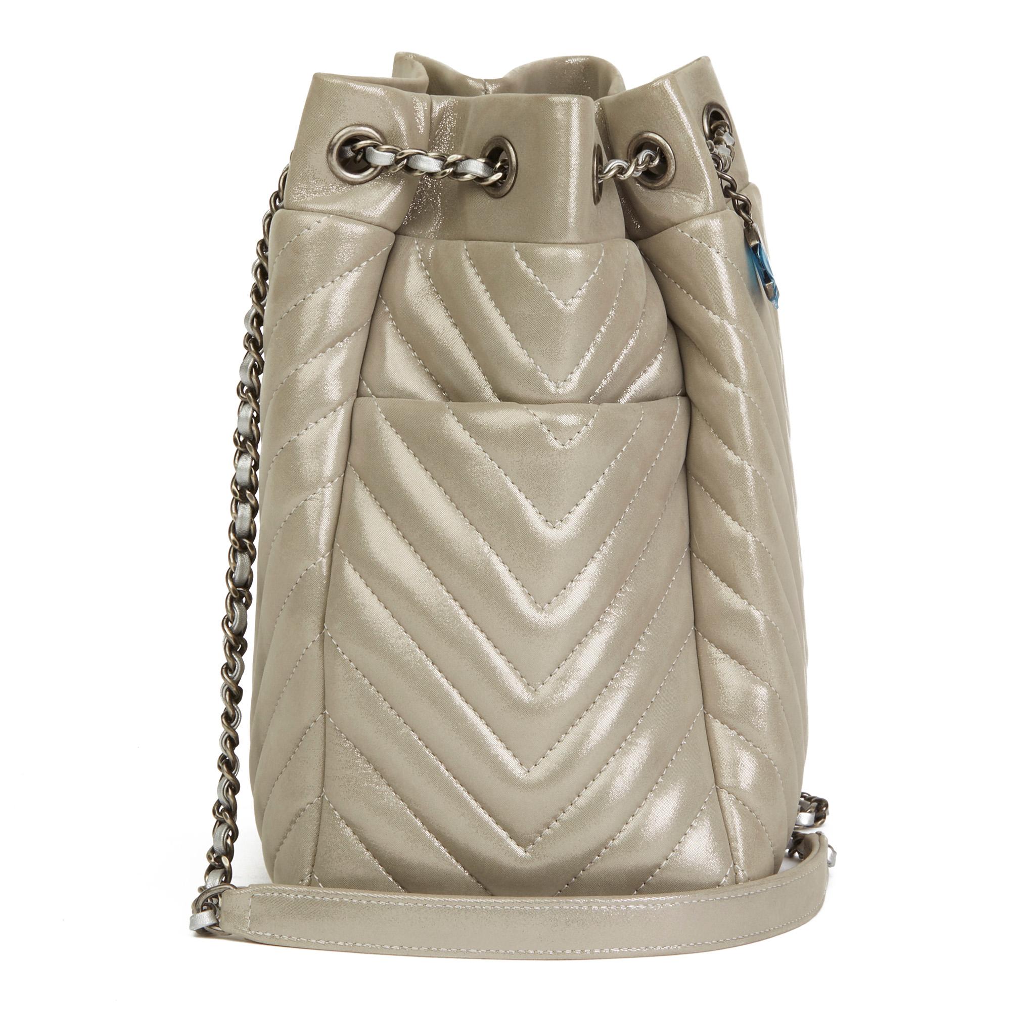 CHANEL
Silver Metallic Chevron Quilted Calfskin Leather Small Urban Spirit Bucket Bag

Serial Number: 22427936
Age (Circa): 2017
Accompanied By: Chanel Dust Bag, Authenticity Card
Authenticity Details: Serial Sticker, Authenticity Card (Made in