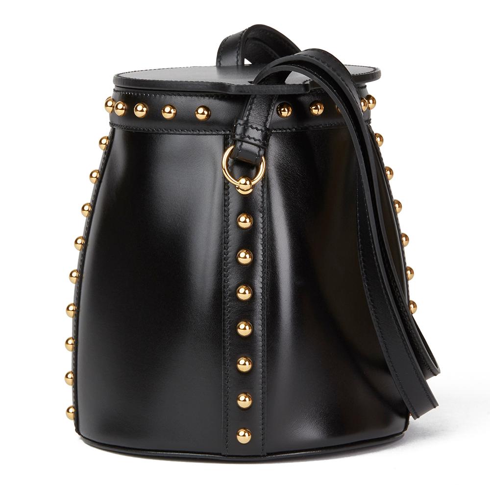 HERMÈS
Black Box Calf Leather Clouté Farming Bucket Bag

Reference: HB2405
Serial Number: A
Age (Circa): 2017
Accompanied By: Hermès Dust Bag, Box, Protective Felt, Invoice
Authenticity Details: Date Stamp (Made in France)
Gender: Ladies
Type: