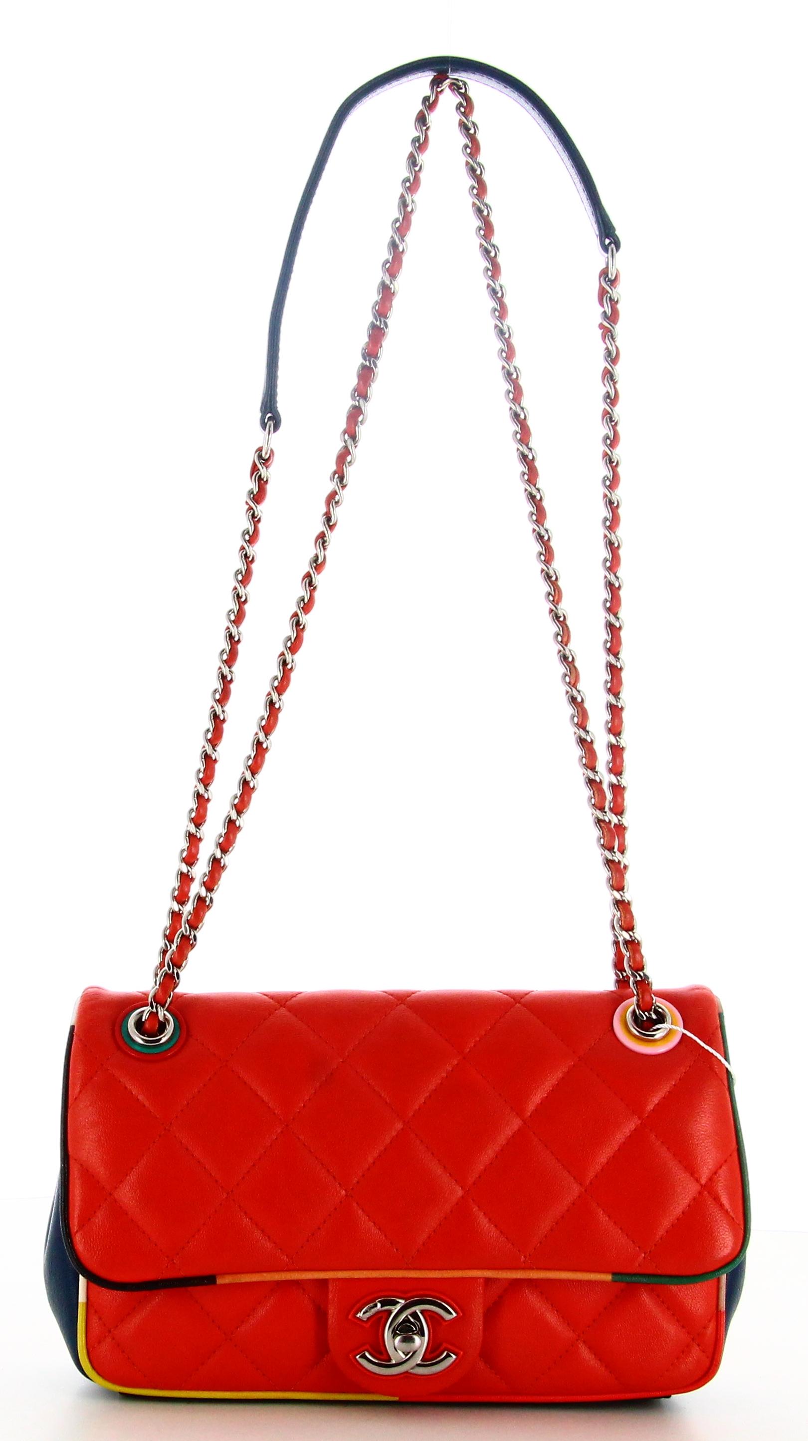 2017 Chanel Paris-Cuba Small Lambskin Color Flap Bag

- Very good condition. Shows very slight signs of wear over time. 
- Chanel Handbag
- Cuba multicolor 
- Double Hanses silver chain
- Double C
- Pocket on back of bag 
- Inside: zipped pocket