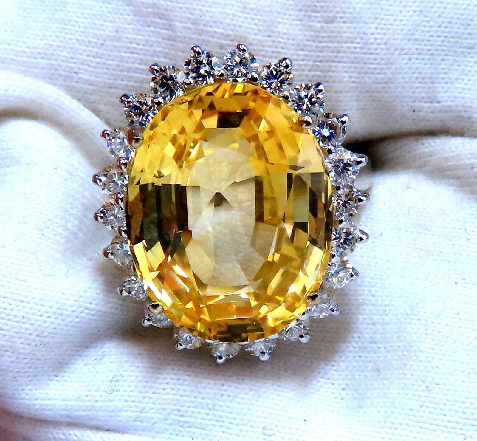 Oval Cut 20.17ct GIA Certified Natural No Heat Yellow Sapphire Diamonds Ring 18kt For Sale