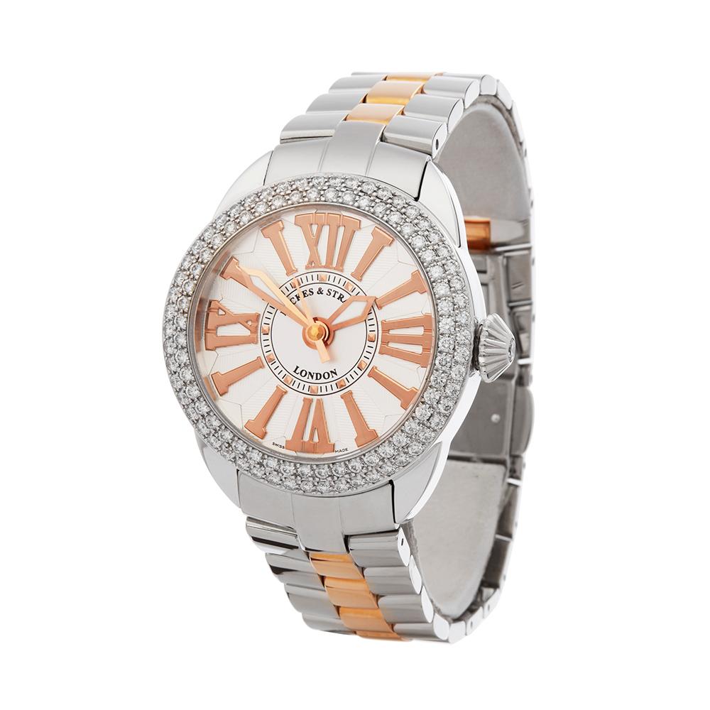 Contemporary 2018 Backes & Strauss Piccadilly Diamond Stainless Steel Wristwatch
 *
 *Complete with: Box, Manuals & Guarantee dated 2018
 *Case Size: 37mm
 *Strap: Stainless Steel & 18K Rose Gold
 *Age: 2018
 *Strap length: Adjustable up to 20cm.