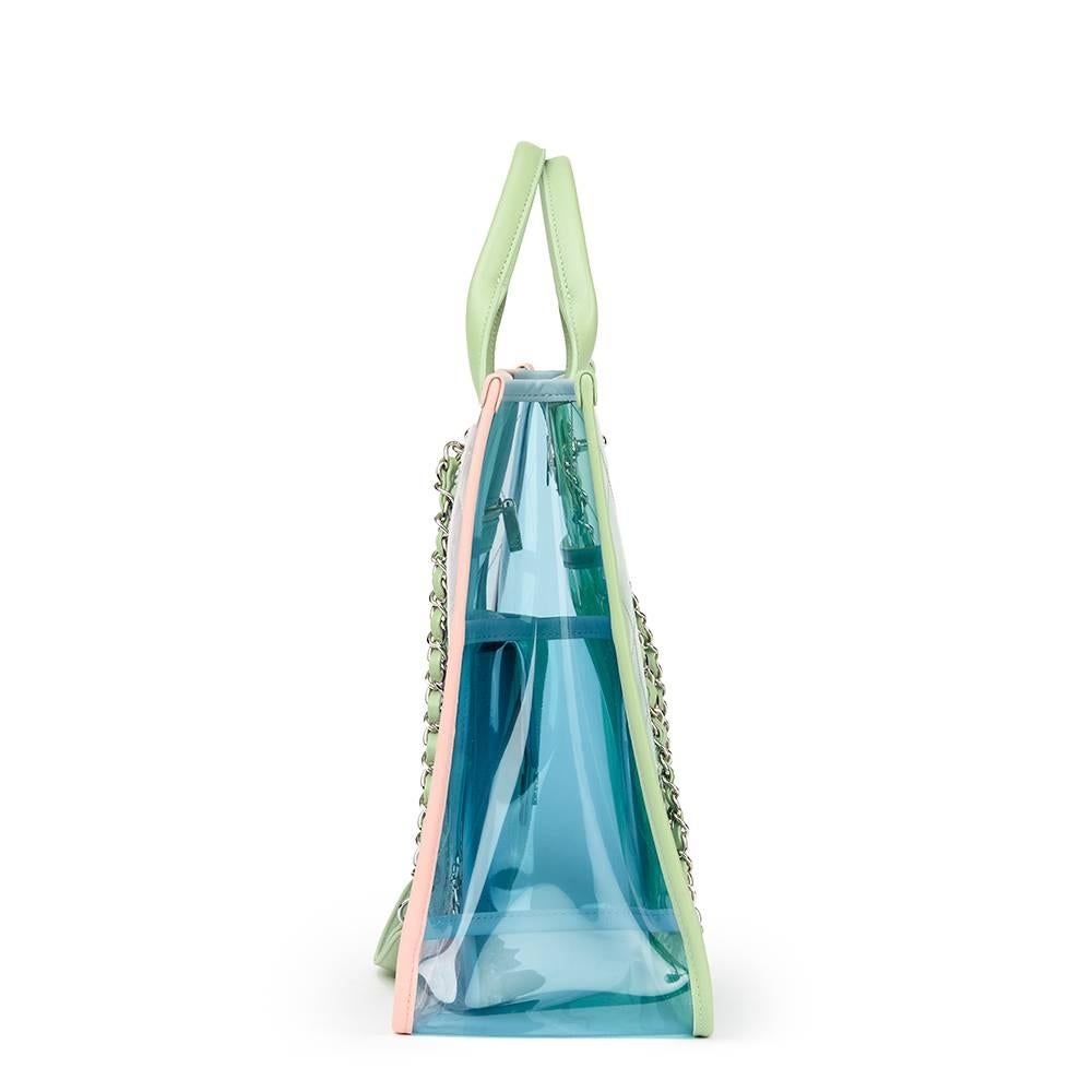 CHANEL
Green, Blue, Pink Lambskin & PVC Large Shopping Tote

 Reference: HB1764
Serial Number: 25698972
Age (Circa): 2018
Accompanied By: Chanel Dust Bag, Box, Authenticity Card, Care Booklet, Harrods Receipt
Authenticity Details: Serial Sticker,