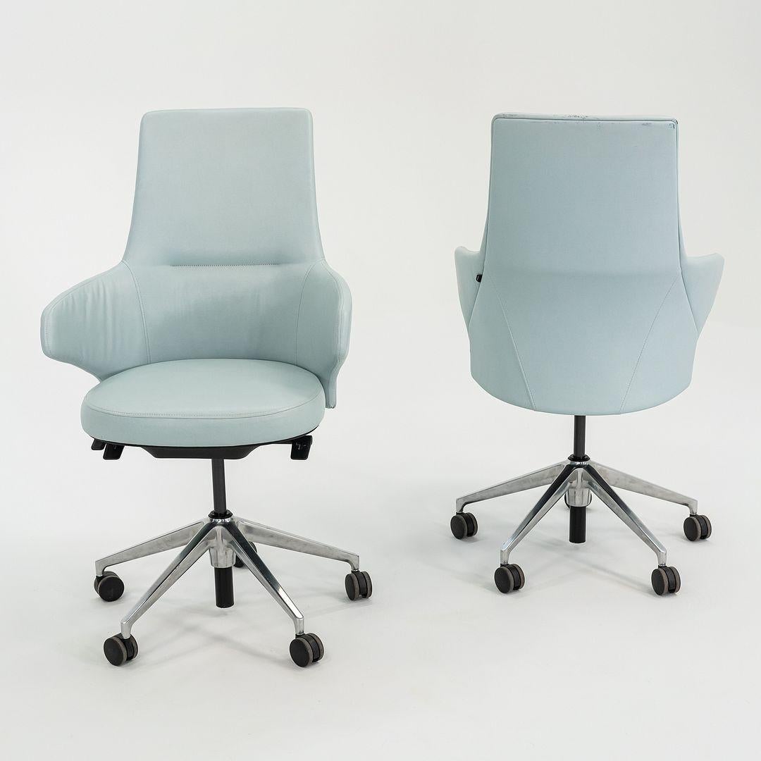 These are Massaud Mid-Back Chairs with Integrated Arms, designed by Jean-Marie Massaud for Coalesse/Steelcase in 2015. These examples date to 2018. The listed price includes one chair, and we have five chairs available for purchase. Their design is