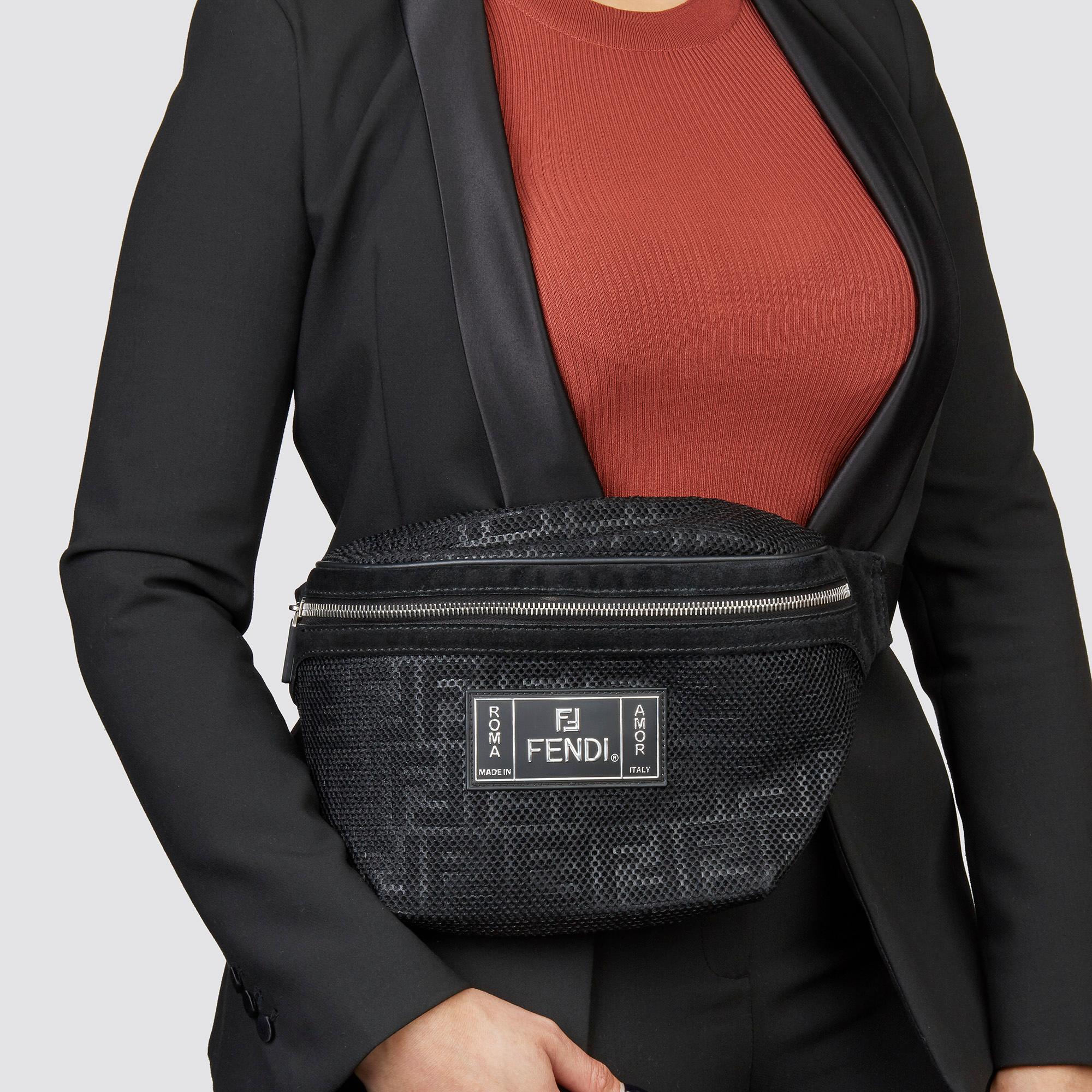 FENDI
Black Zucca Mesh & Suede Belt Bag

Serial Number: 05737275
Age (Circa): 2018
Accompanied By: Tag
Authenticity Details: Serial Stamp (Made in Italy)
Gender: Unisex
Type: Belt Bag

Colour: Black
Hardware: Silver
Material(s): Mesh,