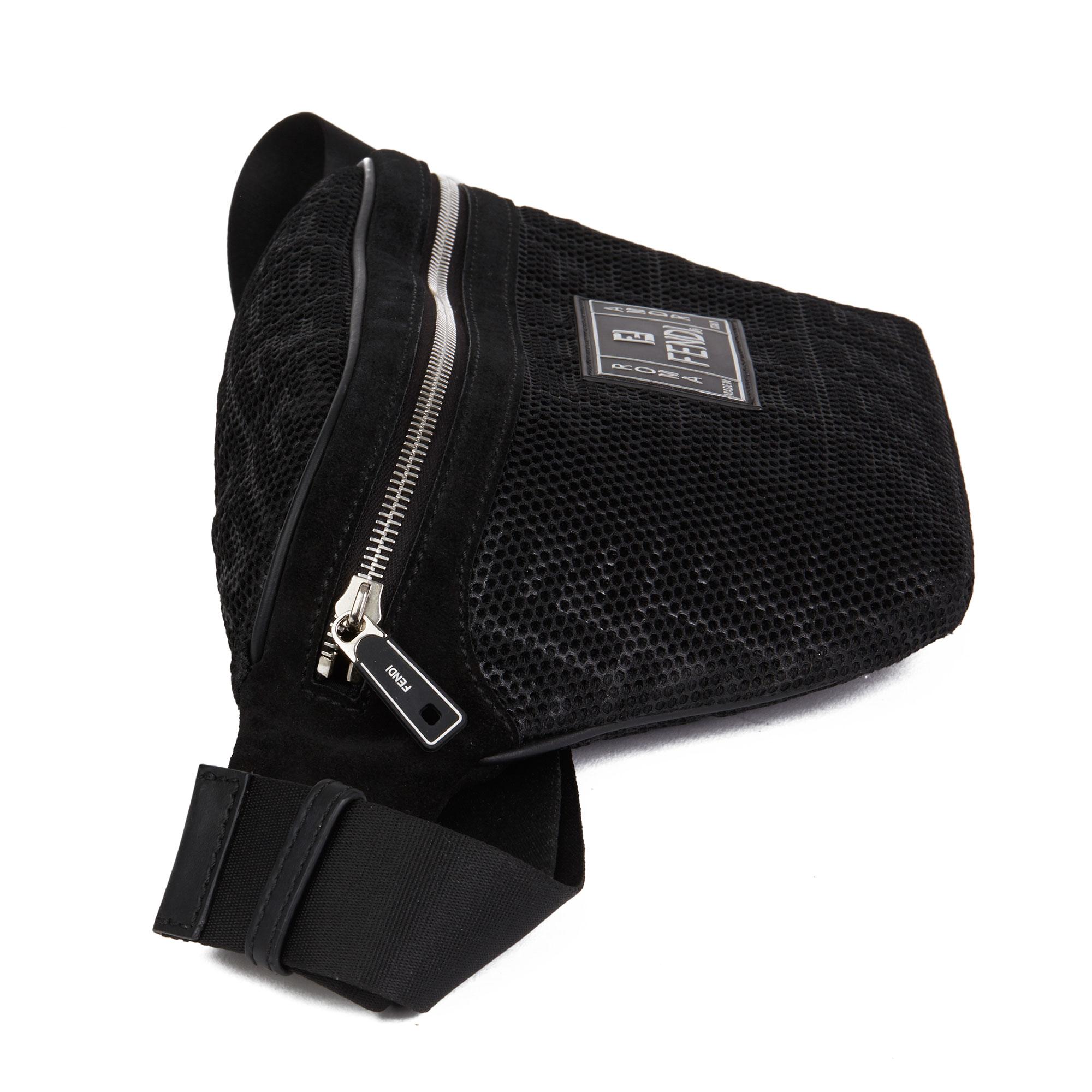 FENDI
Black Zucca Mesh & Suede Belt Bag

Serial Number: 05737275
Age (Circa): 2018
Accompanied By: Tag
Authenticity Details: Serial Stamp (Made in Italy)
Gender: Unisex
Type: Belt Bag

Colour: Black
Hardware: Silver
Material(s): Mesh,