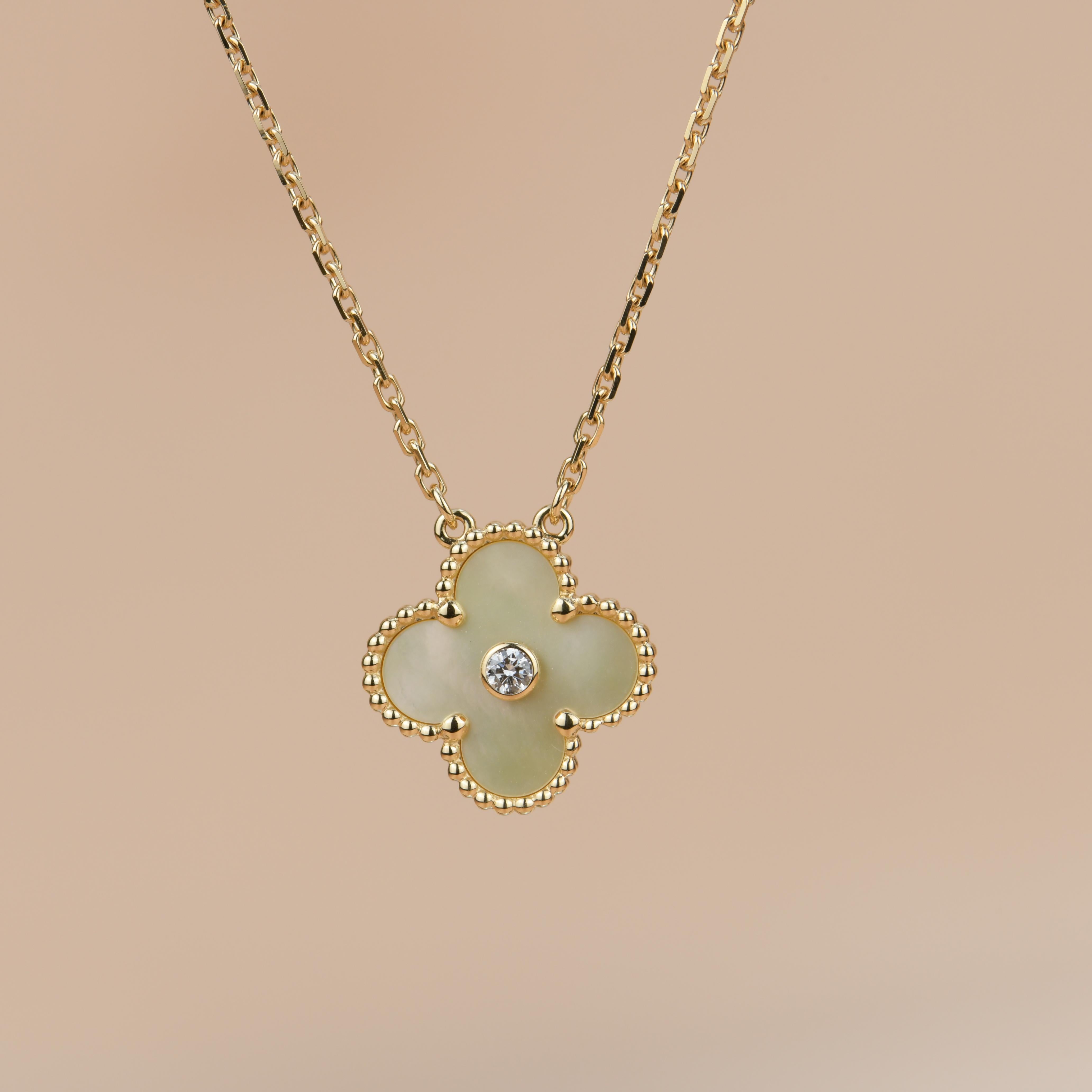 18K Gold Mother Of Pearl Alhambra Diamond Holiday Pendant Necklace was released in 2018 Christmas as the holiday pendant. 

Dandelion Antiques Code:  AT-1224
Brand:  Van Cleef & Arpels
Model:  ARP2R700
Date: 