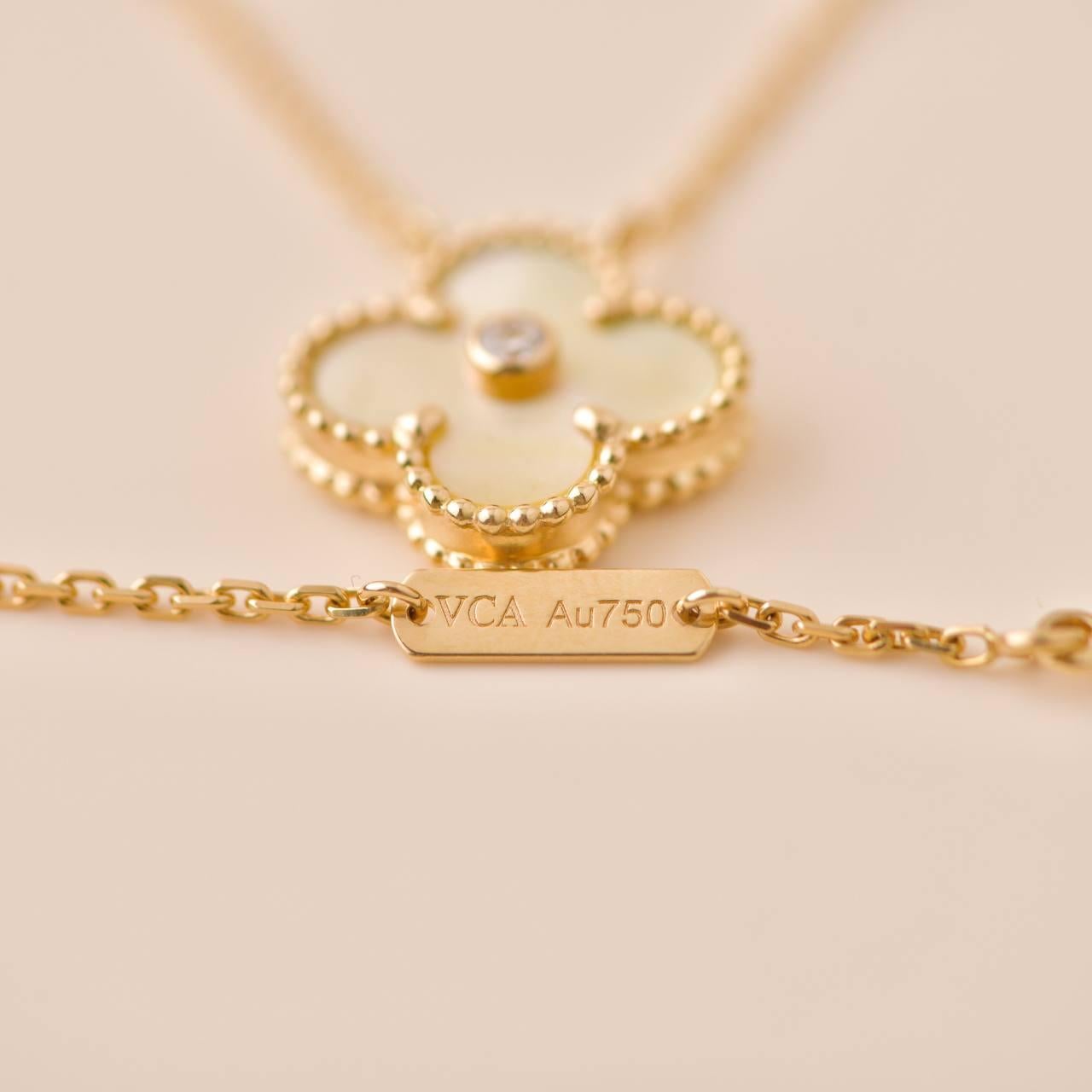 Van Cleef &Arpel Gold Mother Of Pearl Alhambra Diamond Holiday Pendant Necklace In Excellent Condition For Sale In Banbury, GB