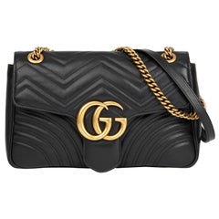 2018 Gucci Schwarzes gestepptes Kalbsleder Medium Marmont