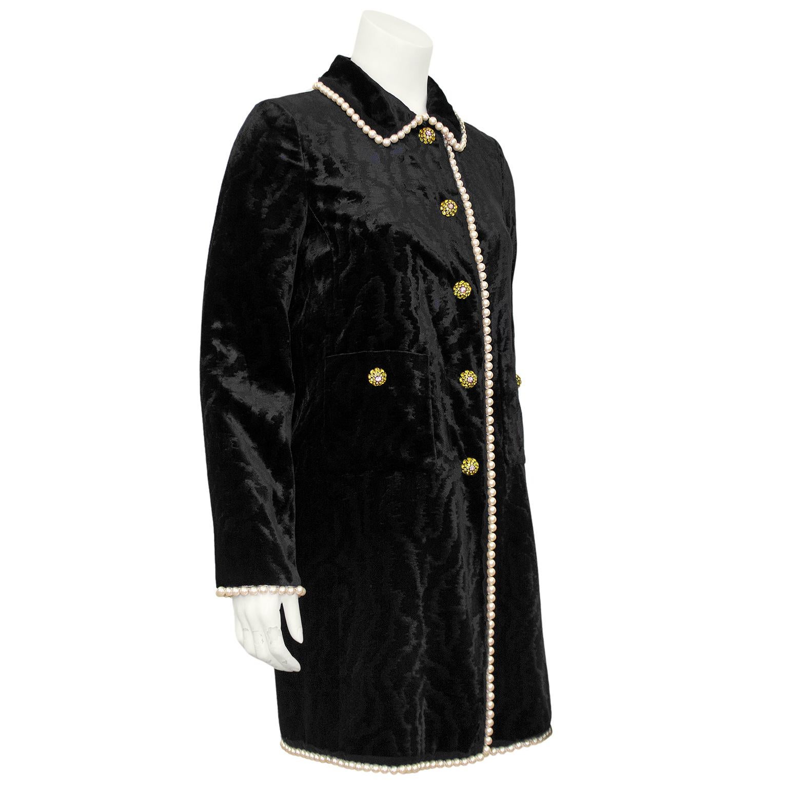 From 2018 and by the incomparable Alessandro Michele, this is an incredible Gucci jacket. Black woven moire velvet with black tulle and large faux pearl trim. Embellished with yellow and pink Swarovski crystal dome shaped buttons. Cream silk lining.