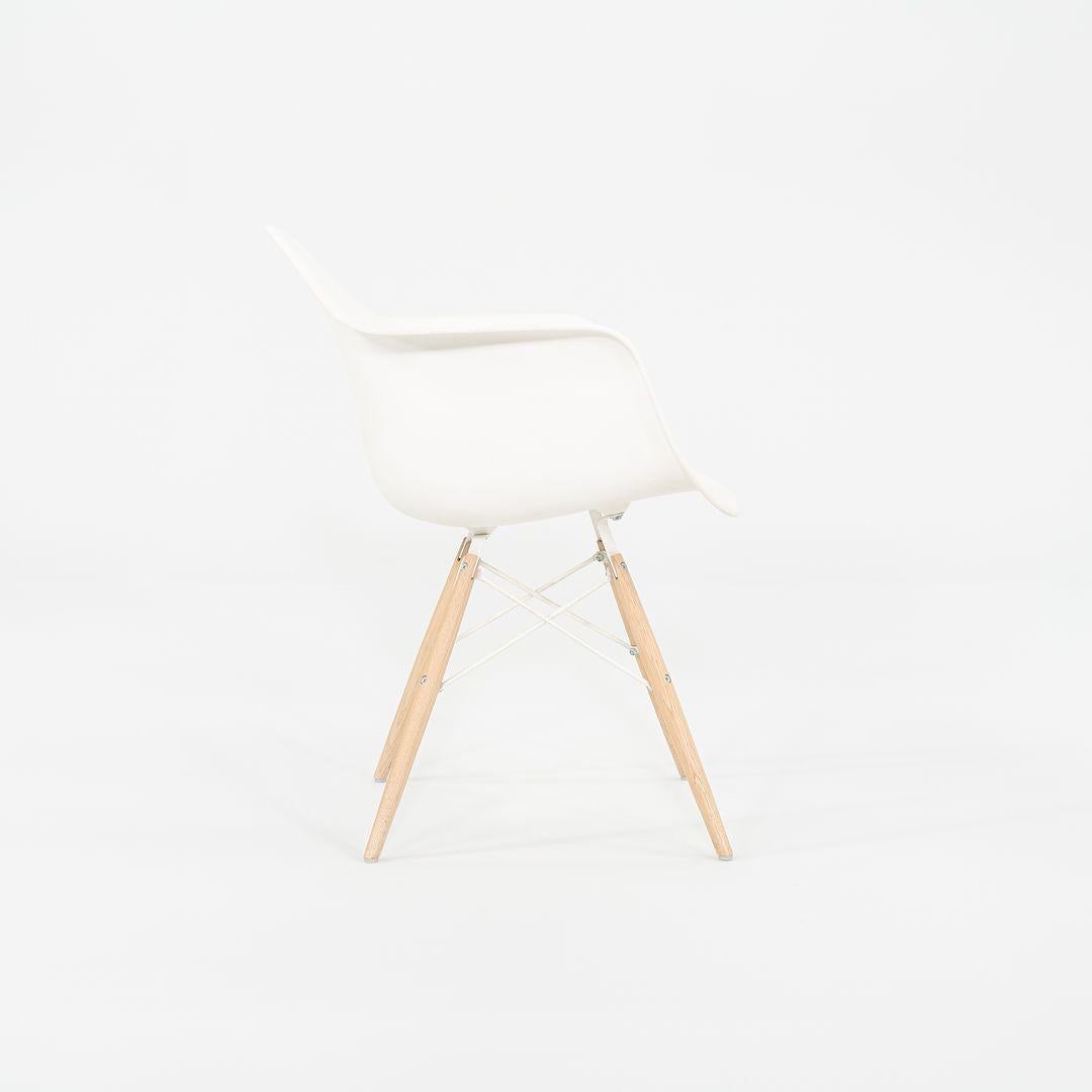 This is an Eames DAW Chair, originally designed by Ray and Charles Eames in the 1950s. This particular example was produced by Herman Miller in the USA in 2018. The listed price includes one DAW chair. This chair features a molded plastic shell in