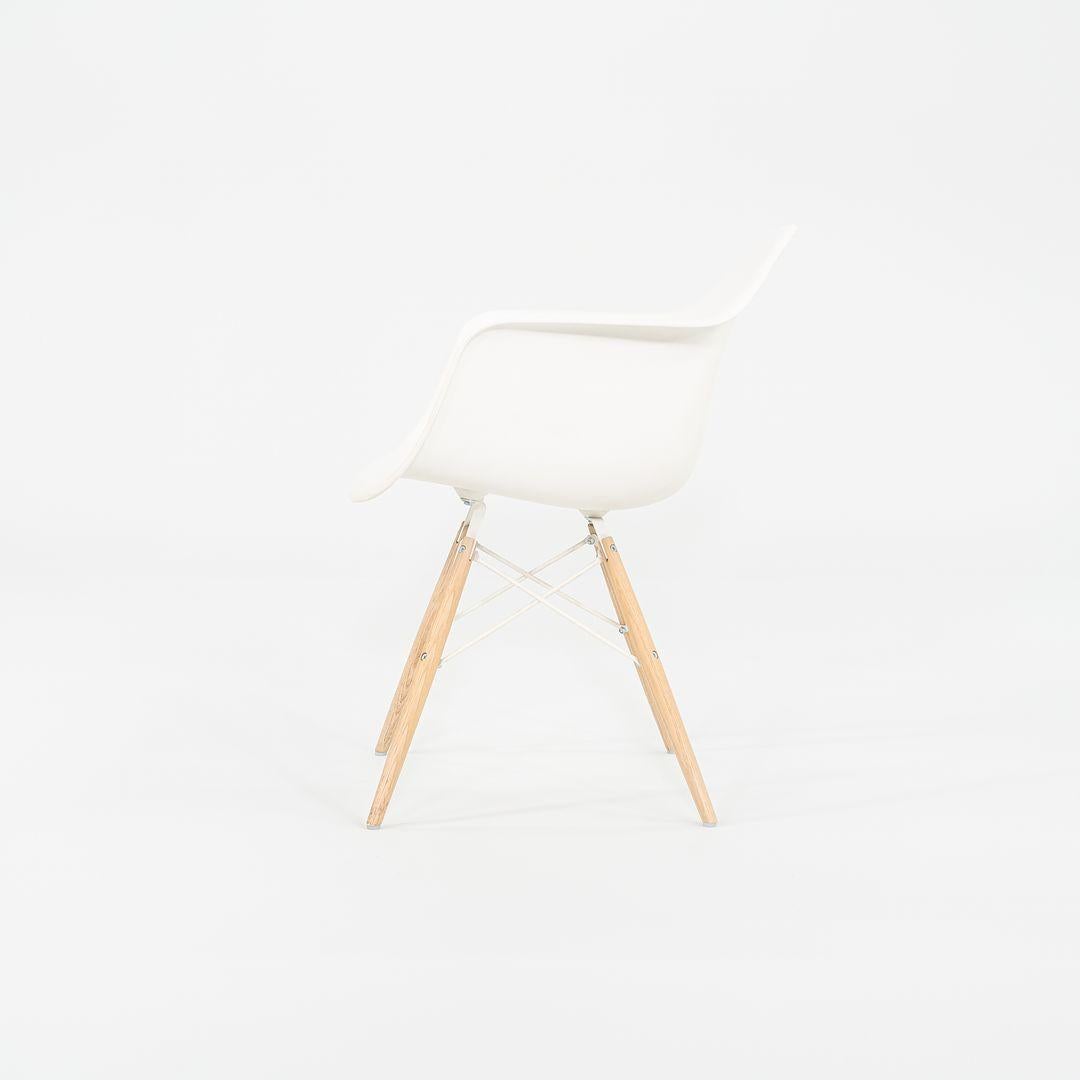 Contemporary 2018 Herman Miller Eames Plastic Arm Shell Chair in White with Beech Eiffel Base