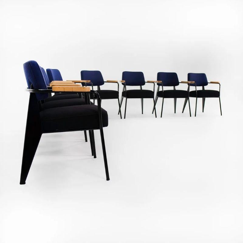 This is a single Fauteuil Direction dining / side chair designed by Jean Prouvé and produced by Vitra in 2018. Multiple chairs are available, though the price listed is for each chair. The chairs were specified in blue and black fabric with oiled