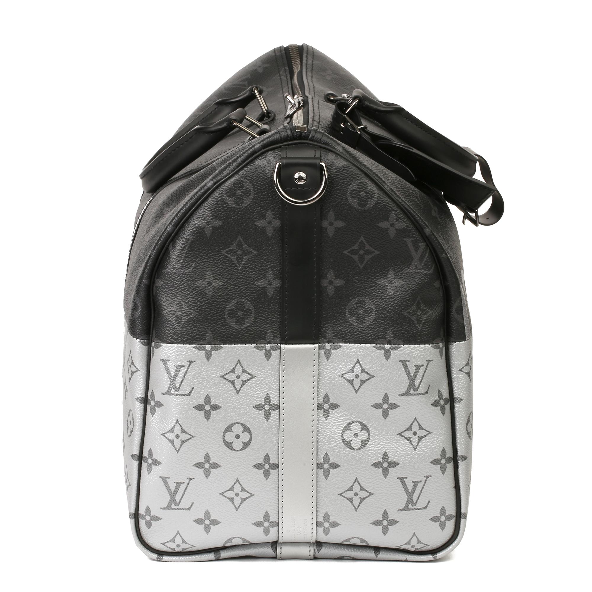 LOUIS VUITTON
Black & Silver Monogram Eclipse Coated Canvas & Black Calfskin Leather Split Keepall 50 Bandoulière

Xupes Reference: HB3858
Serial Number: DR1108
Age (Circa): 2018
Accompanied By: Louis Vuitton Dust Bag, Box, Padlock, Keys, Luggage