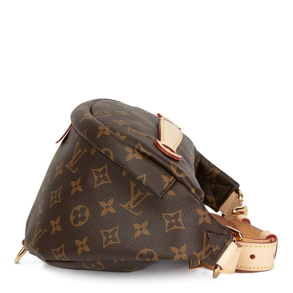 LOUIS VUITTON
Brown Monogram Coated Canvas Bumbag

This LOUIS VUITTON Bumbag is in Unworn Condition accompanied by Louis Vuitton Dust Bag, Box, Care Booklet, Tag, Invoice. Circa 2018. Primarily made from Coated Canvas, Vachetta Leather complimented