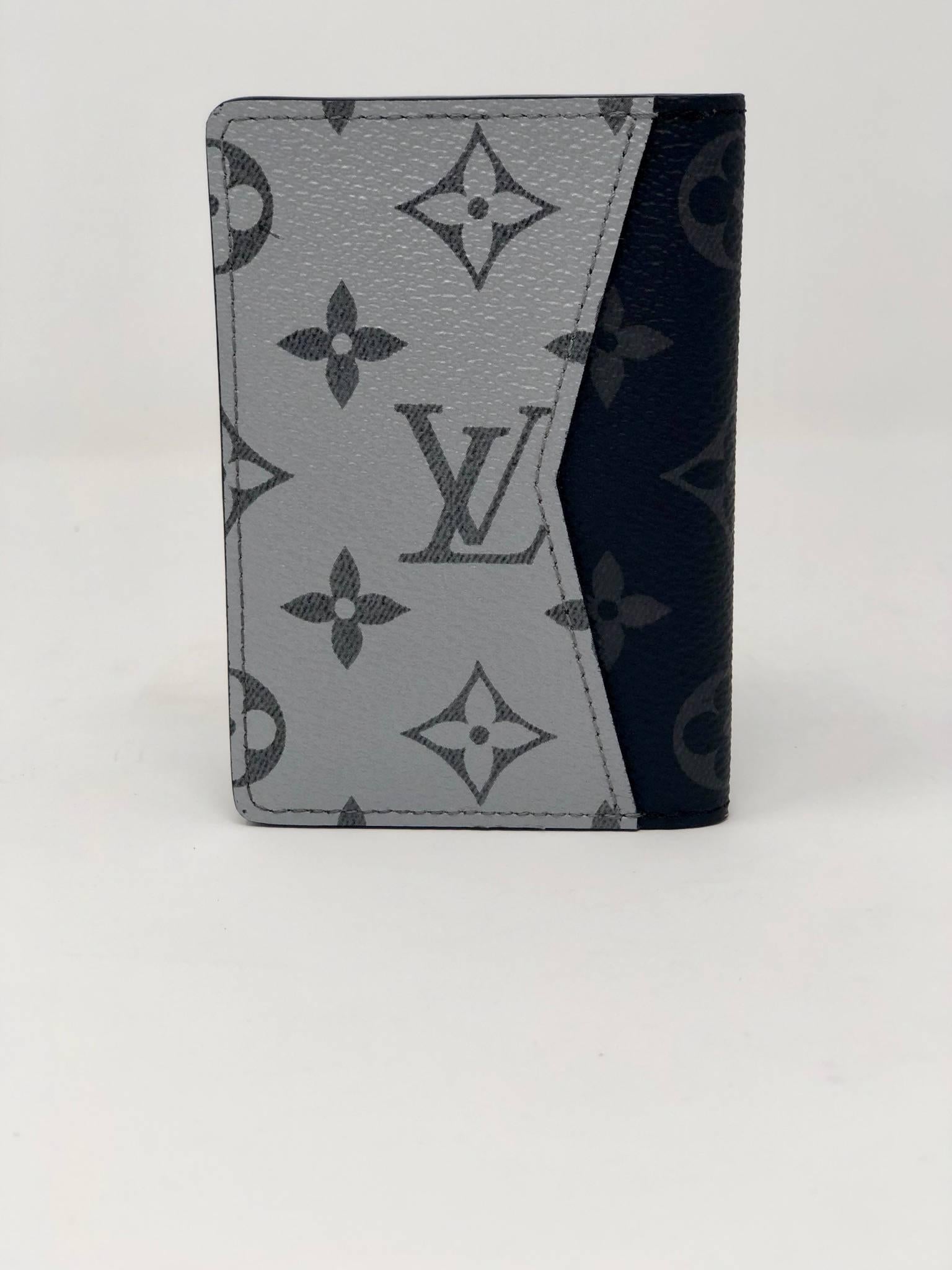 Sold out LV Silver Eclipse Pocket Organizer Wallet. Brand new condition with dust cover and box. Kim Jones collection. 3 credit card slots, 5 interior pockets, 1 external pocket. 