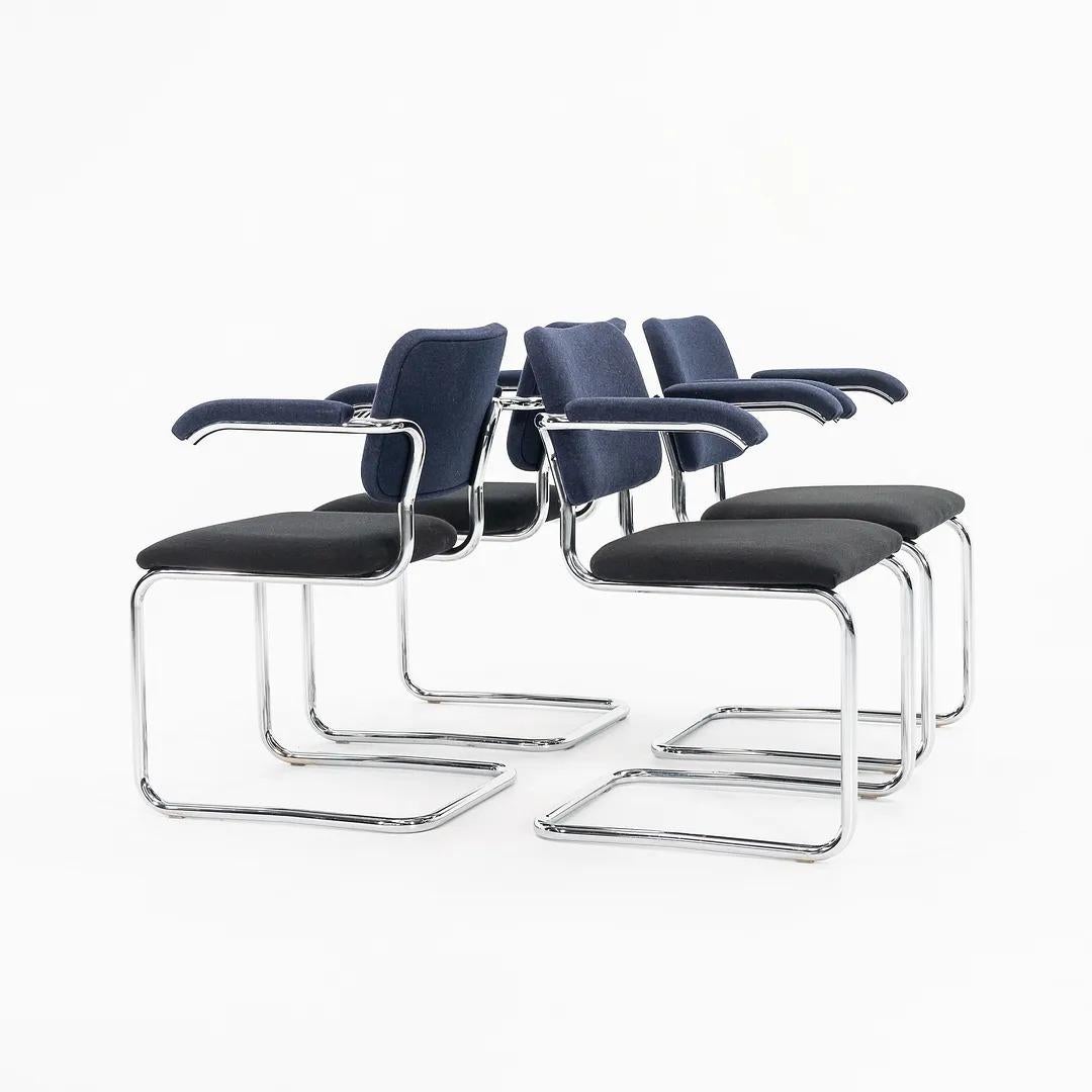 This is a Cesca armchair, model 50A, originally designed by Marcel Breuer in 1928. The listed price includes one 50A chair, and we have several available for individual purchase. These examples were manufactured by Knoll in 2018. The design features