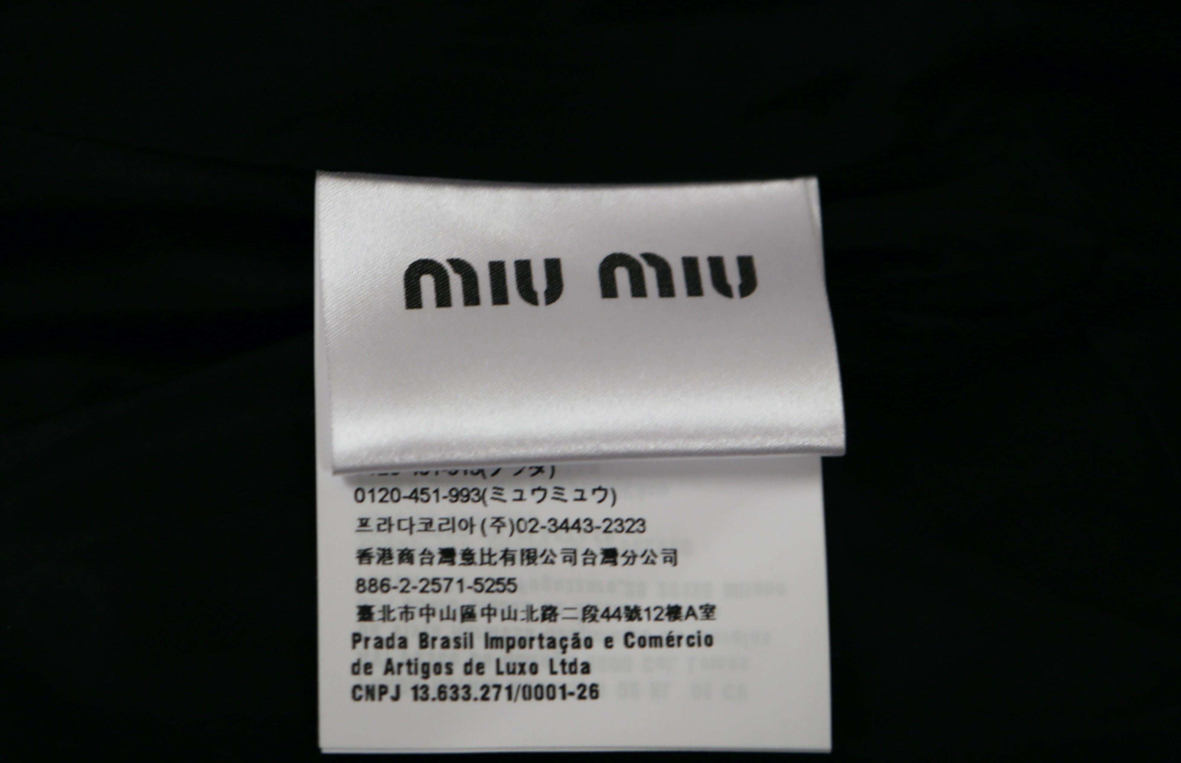 2018 MIU MIU - Jupe en cuir vieilli avec ceinture en vente 4