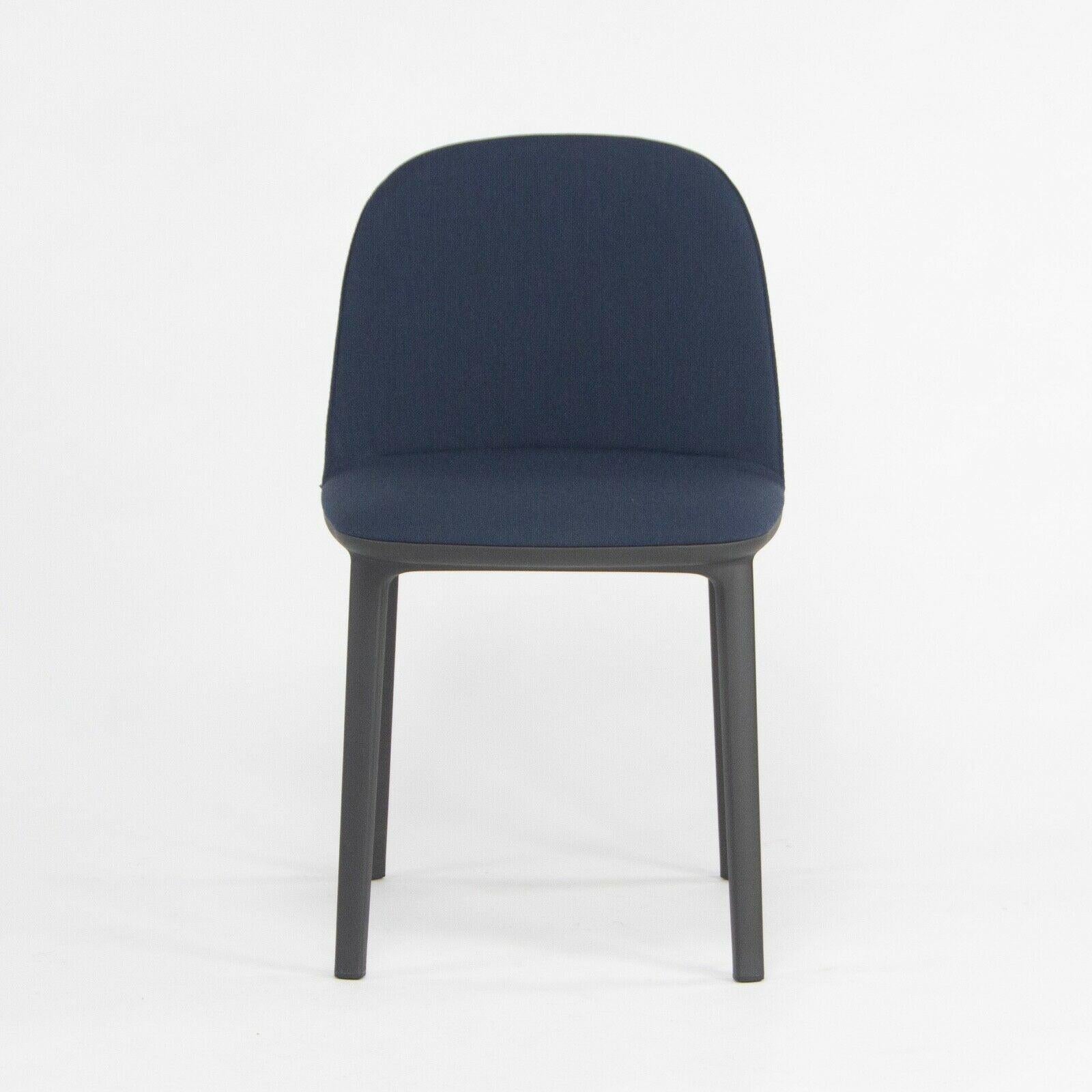 Listed for sale is Softshell Side Chair designed by Ronan and Erwan Bouroullec and produced by Vitra. This chair was constructed with a black plastic base and seat upholstered with dark (navy) blue fabric. The condition is described as 