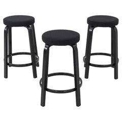 2019 Aino and Alvar Aalto for Artek Stool 64 in Ebonized Wood with Fabric Seats