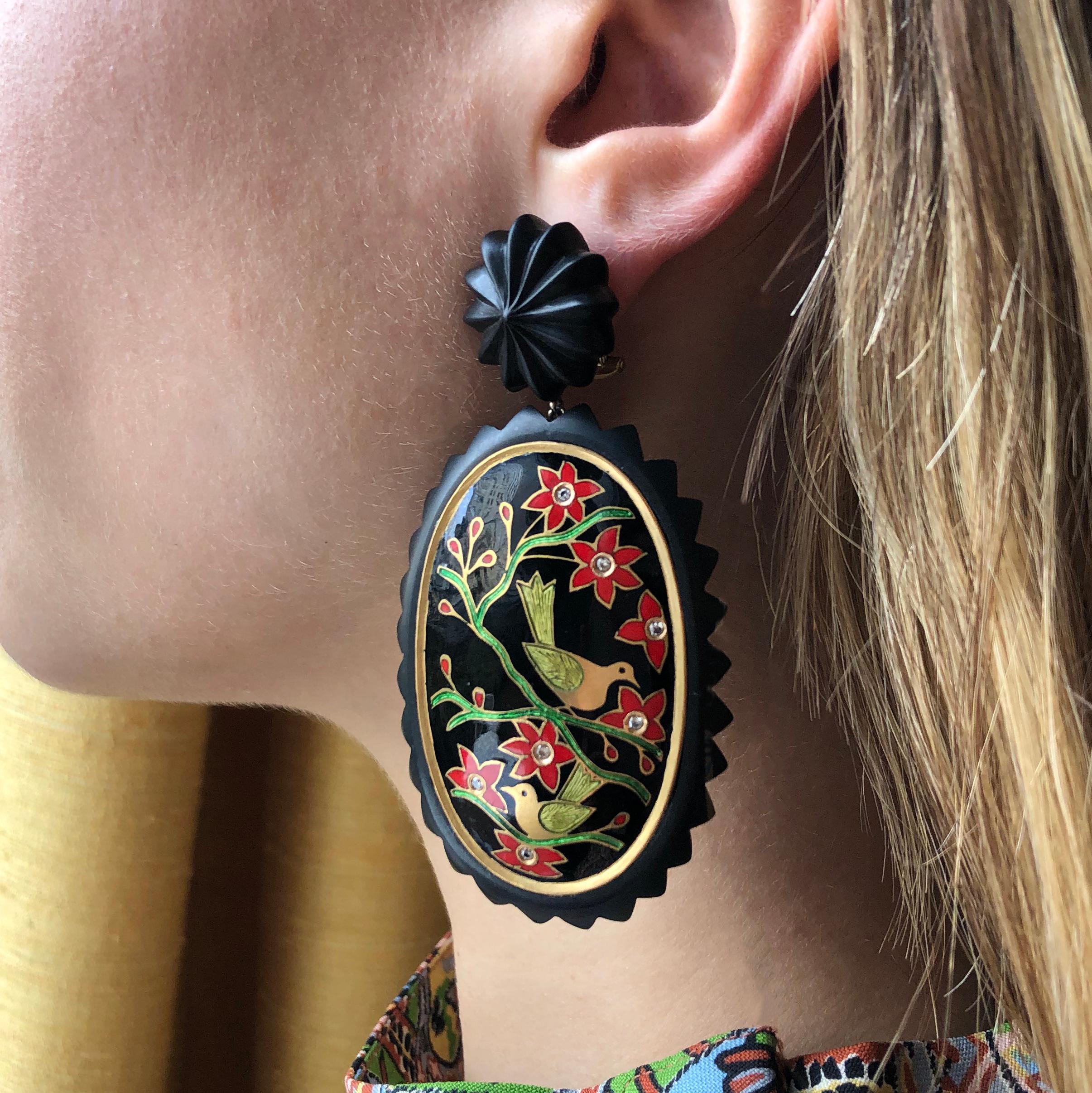 A pair of hand carved ebony, enamel diamond and 22 karat gold Landscape earrings, by Alice Cicolini, 2019. Stamped 18ct, with post backs for pierced ears. 

Cicolini is a London-based contemporary jewelry designer and advocate of heritage