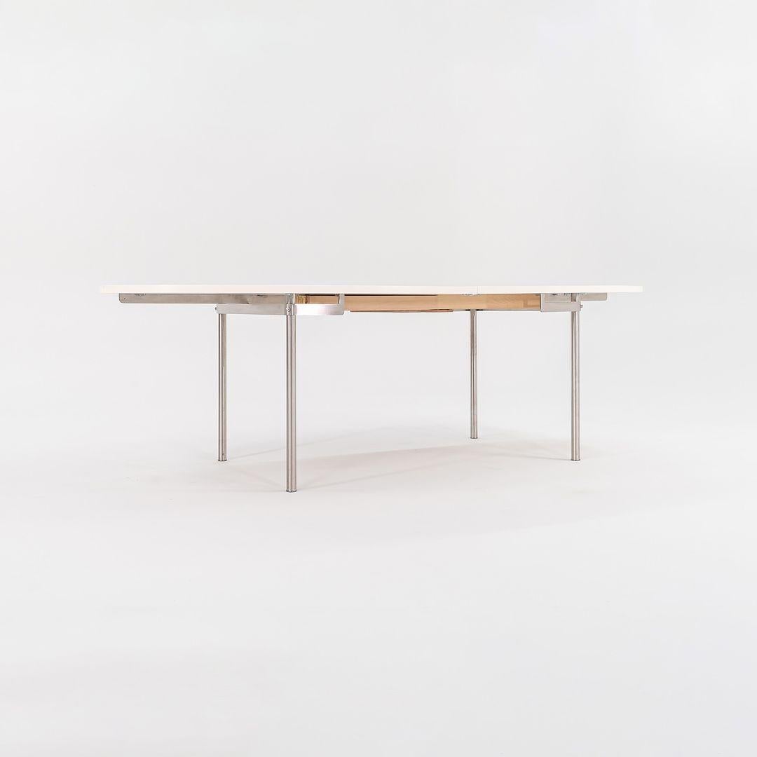 2019 Carl Hansen CH336 Mesa de comedor extensible en laminado blanco con patas de acero en Bueno estado para la venta en Philadelphia, PA
