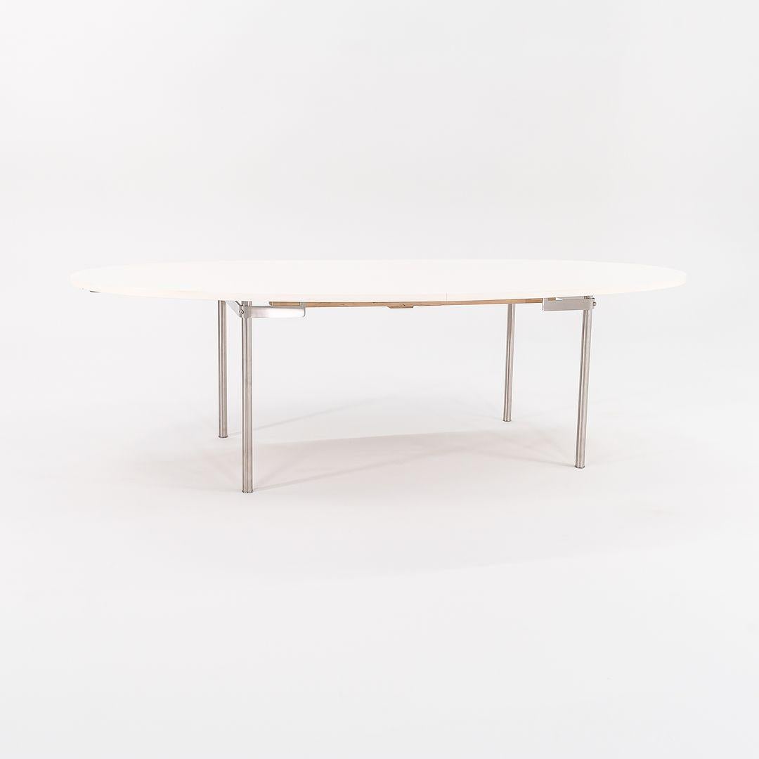 2019 Carl Hansen CH336 Mesa de comedor extensible en laminado blanco con patas de acero Acero inoxidable en venta