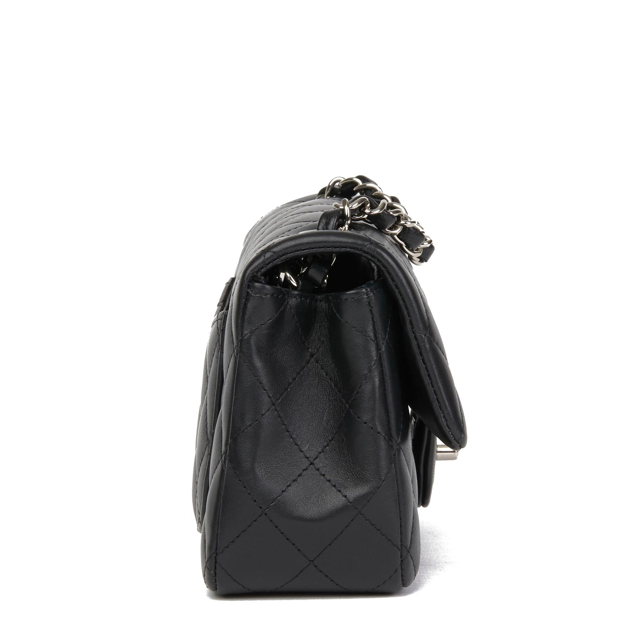 CHANEL
Black Quilted Lambskin Rectangular Mini Flap Bag

Reference: HB2694
Serial Number: 26968129
Age (Circa): 2019
Accompanied By: Chanel Dust Bag, Box, Authenticity Card, Invoice
Authenticity Details: Serial Sticker, Authenticity Card (Made in