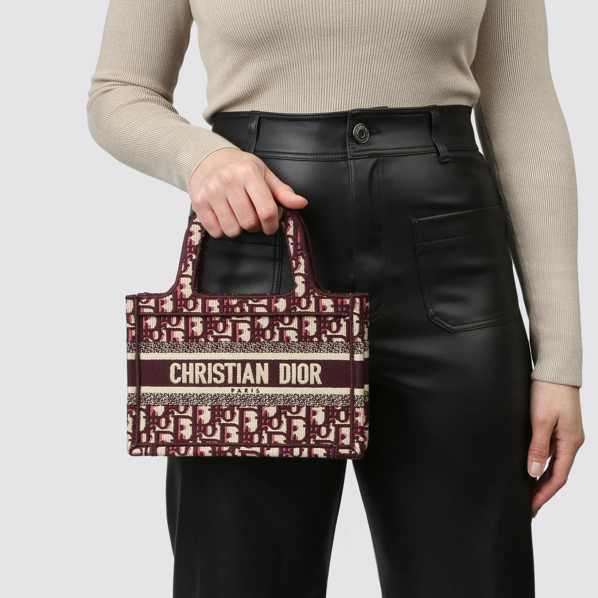 CHRISTIAN DIOR
Burgundy Oblique Monogram Canvas Mini Book Tote 

Xupes Reference: HB3891
Serial Number: 50-MA-0189
Age (Circa): 2019
Accompanied By: Christian Dior Dust Bag, Box, Authenticity Card
Authenticity Details: Authenticity Card, Date Stamp