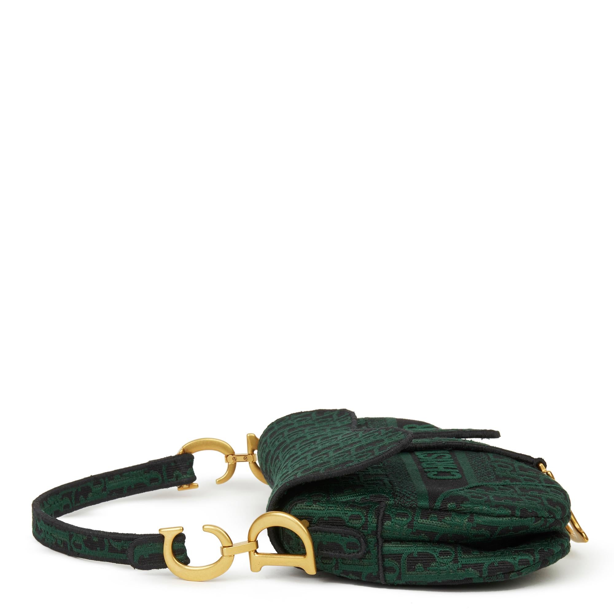 CHRISTIAN DIOR
Green & Black Oblique Canvas Saddle Bag

Xupes Reference: HB2980
Serial Number: 02-MA-0179
Age (Circa): 2019
Accompanied By: Dior Dust Bag, Box, Authenticity Card, Care Booklet
Authenticity Details: Date Stamp (Made in Italy)
Gender: