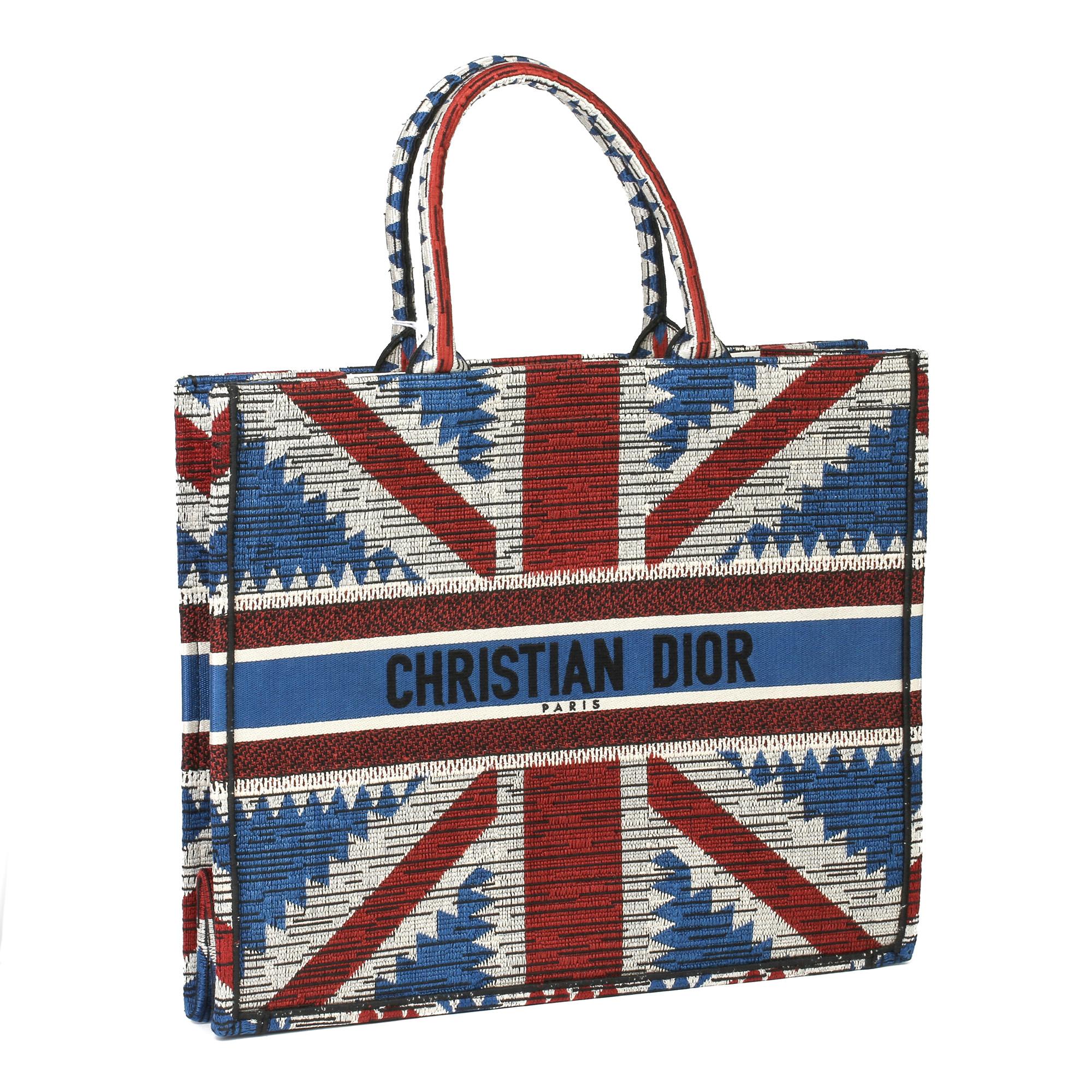 CHRISTIAN DIOR
Red, White & Blue Canvas Union Jack Book Tote

Xupes Reference: CB332
Serial Number: 50-MA-0159X
Age (Circa): 2019
Accompanied By: Christian Dior Dust Bag, Authenticity Card, Care Booklet 
Authenticity Details: Authenticity Card, Date