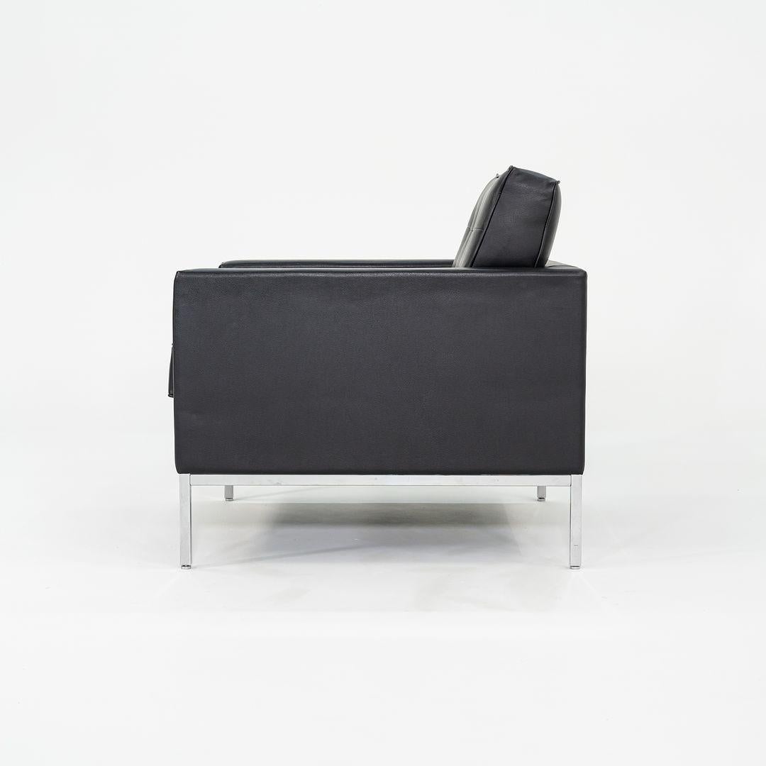 These are Florence Knoll Lounge Chairs, originally designed by Florence Knoll for Knoll in 1954. These particular examples were produced by Knoll Studio in the USA during 2019. The chairs features an exposed square tubular-steel frame, and are