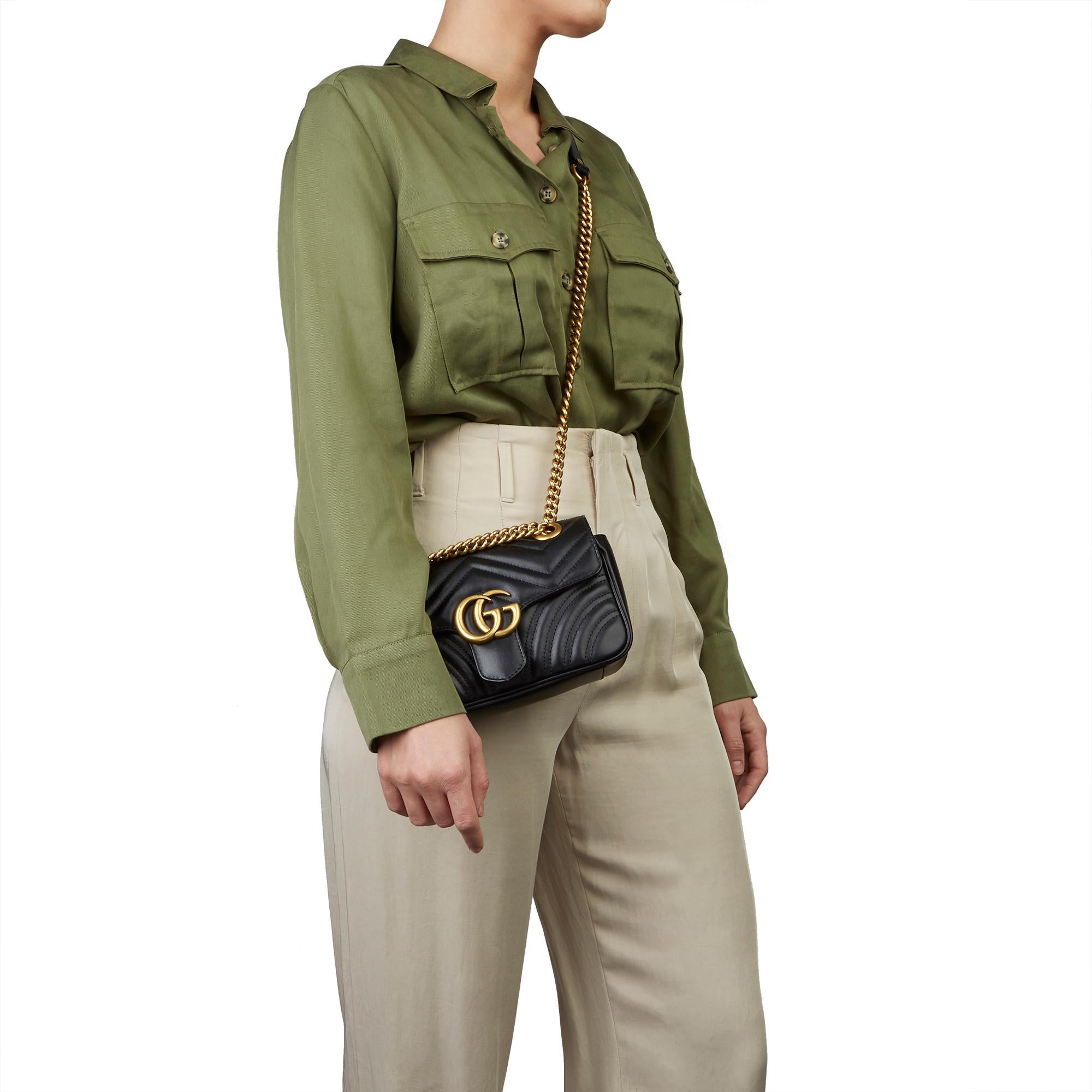 GUCCI
Black Quilted Calfskin Leather Mini Marmont

Xupes Reference: HB3332
Serial Number: 446744 213043
Age (Circa): 2019
Authenticity Details: Date Stamp (Made in Italy) 
Gender: Ladies
Type: Shoulder, Crossbody

Colour: Black
Hardware: Antiqued