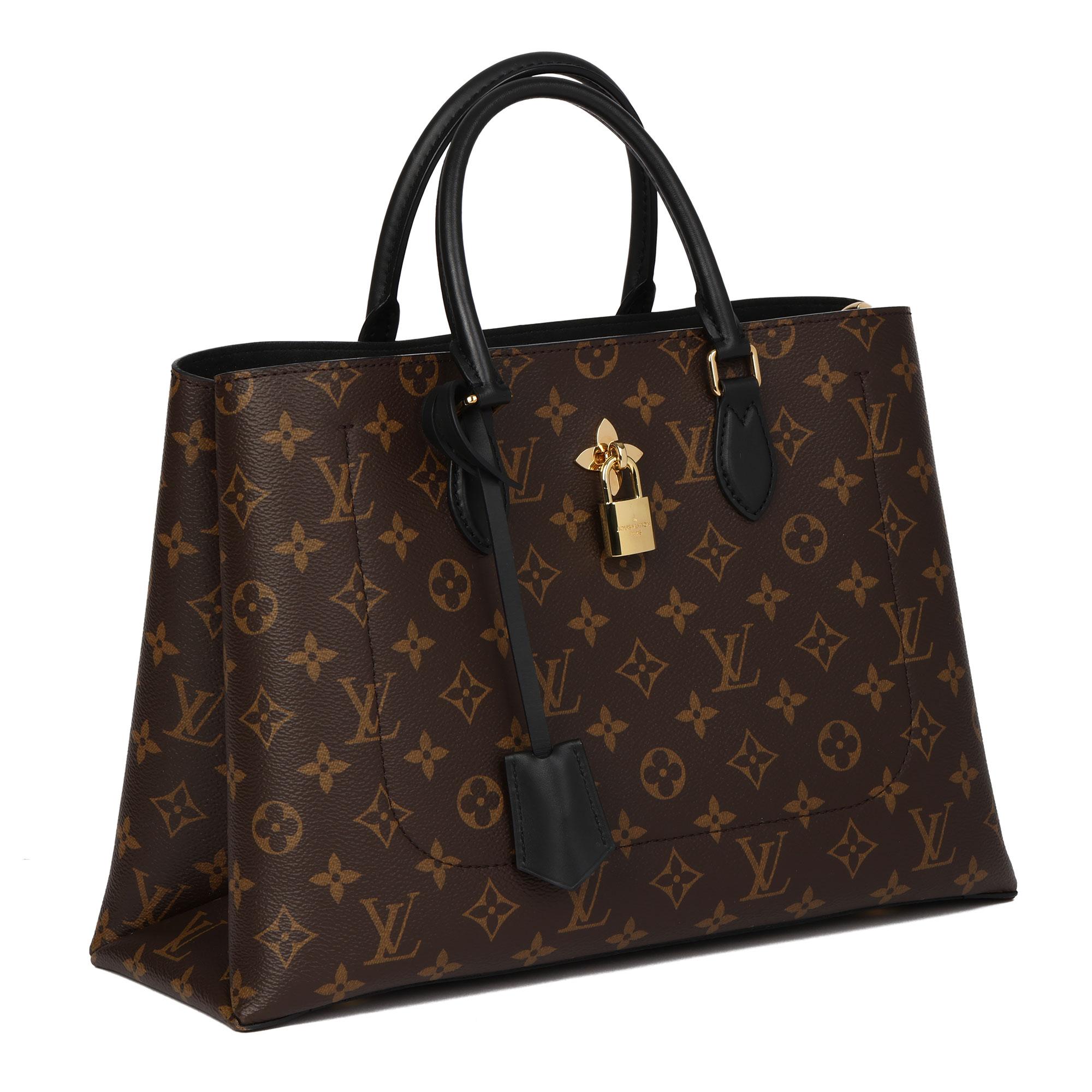 LOUIS VUITTON
Brown Monogram Coated Canvas & Black Calfskin Leather Flower Tote

Serial Number: AH3149
Age (Circa): 2019
Accompanied By: Louis Vuitton Dust Bag, Box, Care Booklet, Shoulder Strap, Lock, Keys, Clochette
Authenticity Details: Date
