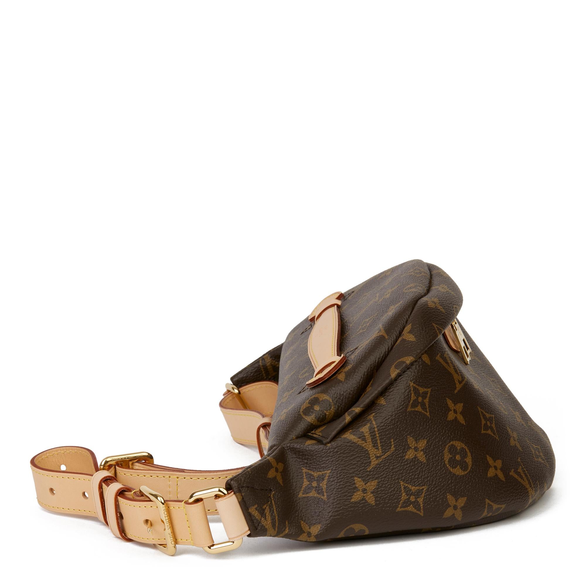 LOUIS VUITTON
Brown Monogram Coated Canvas Bum Bag

Xupes Reference: HB3384
Serial Number: SA3159
Age (Circa): 2019
Accompanied By: Louis Vuitton Dust Bag, Care Booklet, Receipt
Authenticity Details: Date Stamp (Made in France) 
Gender: Unisex
Type: