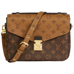 2019 Louis Vuitton Brown Monogram Coated Canvas Reverso Pochette Metis