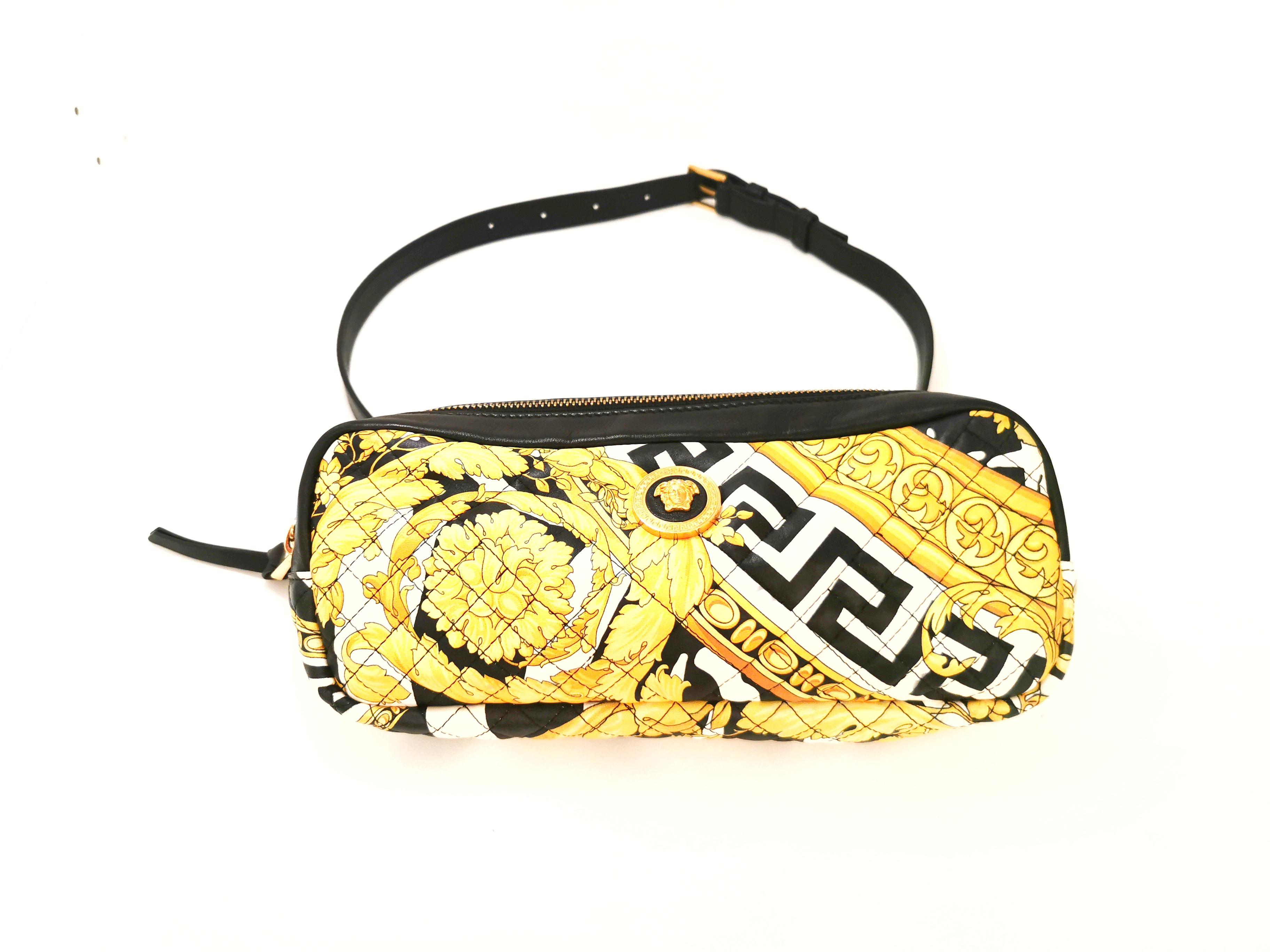 Elevate your fashion ensemble with the 2019 VERSACE Medusa Greca Baroque Print Lambskin Leather Waist Bag, a stunning fusion of opulence and practicality. Crafted by the iconic Italian fashion house Versace, this waist bag is a true embodiment of