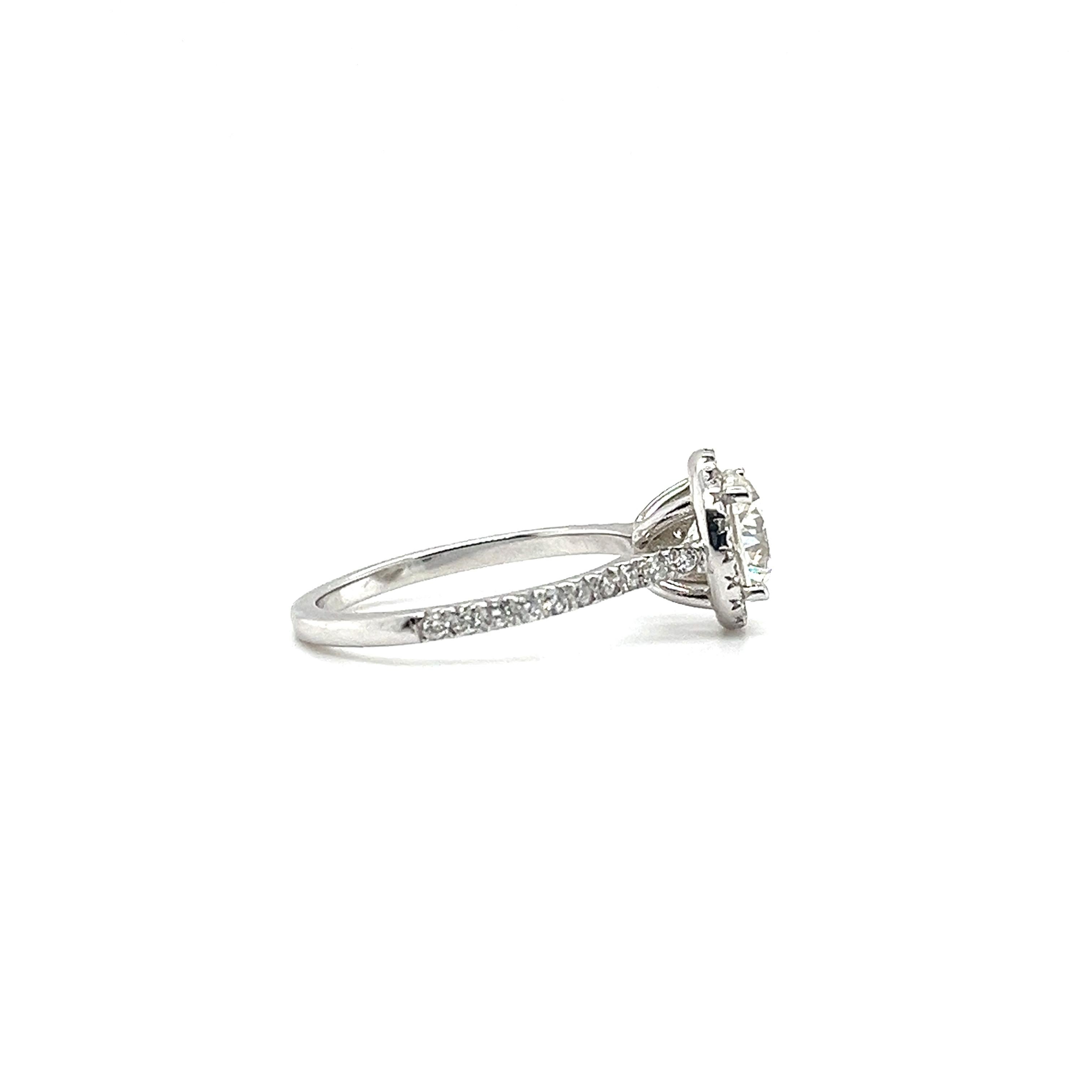 Introducing an engagement ring that cannot be denied. This gorgeous ring consists of a center diamond stone weighing 1.50ct, followed by the side diamonds weighing 0.51ct. Shining bright at every given angle, this ring will catch the eyes of