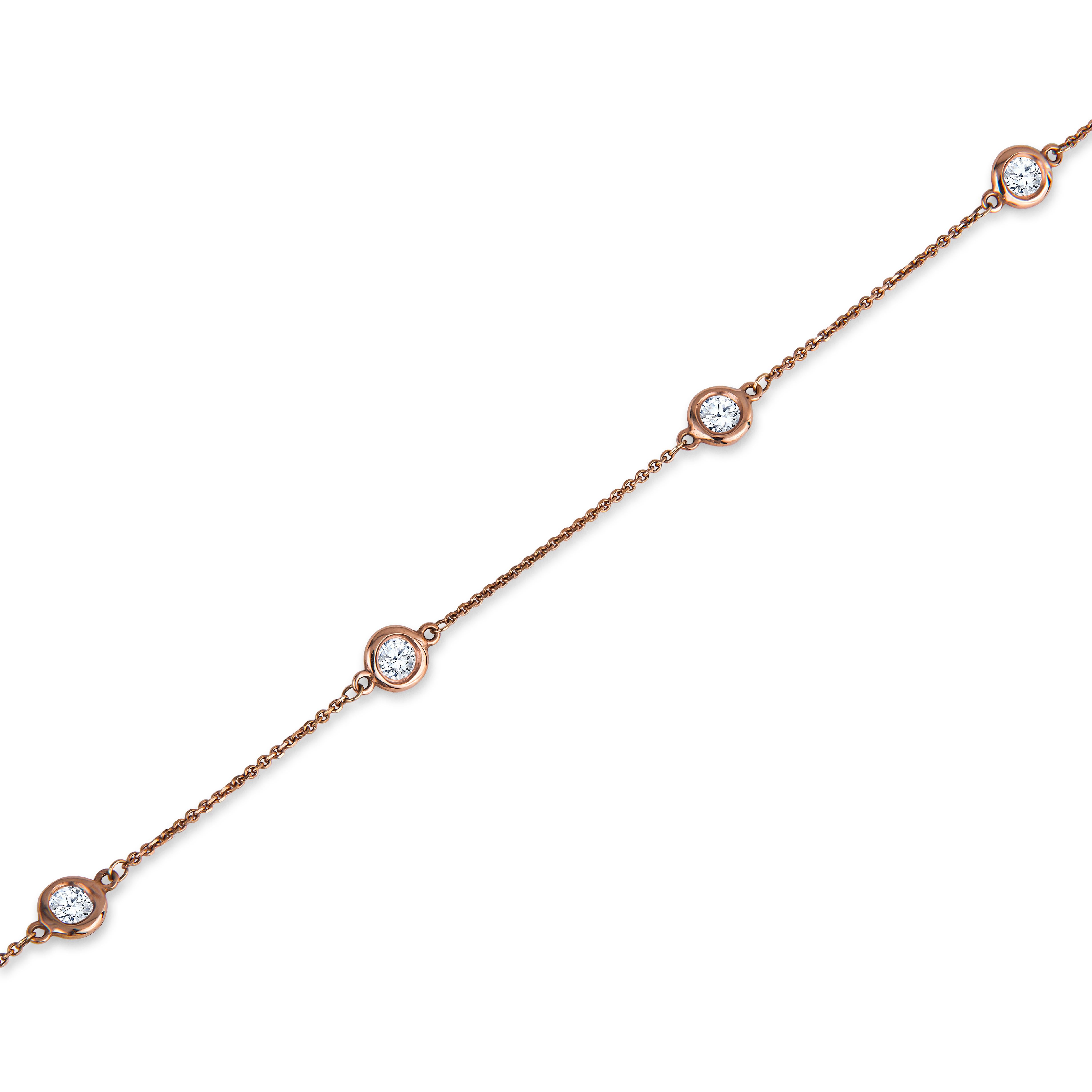 This station necklace is part of our Soft Glamour collection. It features 12 round diamonds with a 2.01ctw, set in a 14kt rose gold 18 inch chain. It is the ideal necklace to add elegance for everyday wear.