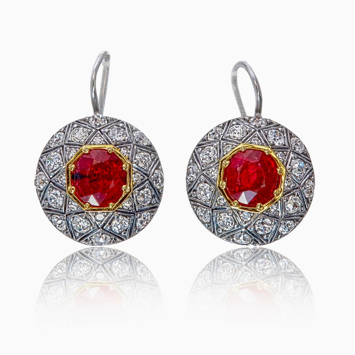 Add a touch of classic elegance to your jewels collection with these stunning ruby and diamond earrings made by Rewa jewels crafted in 18 karat white gold.

- The centre stones are two Burmese rubies without any heat treatment, pigeon blood colour