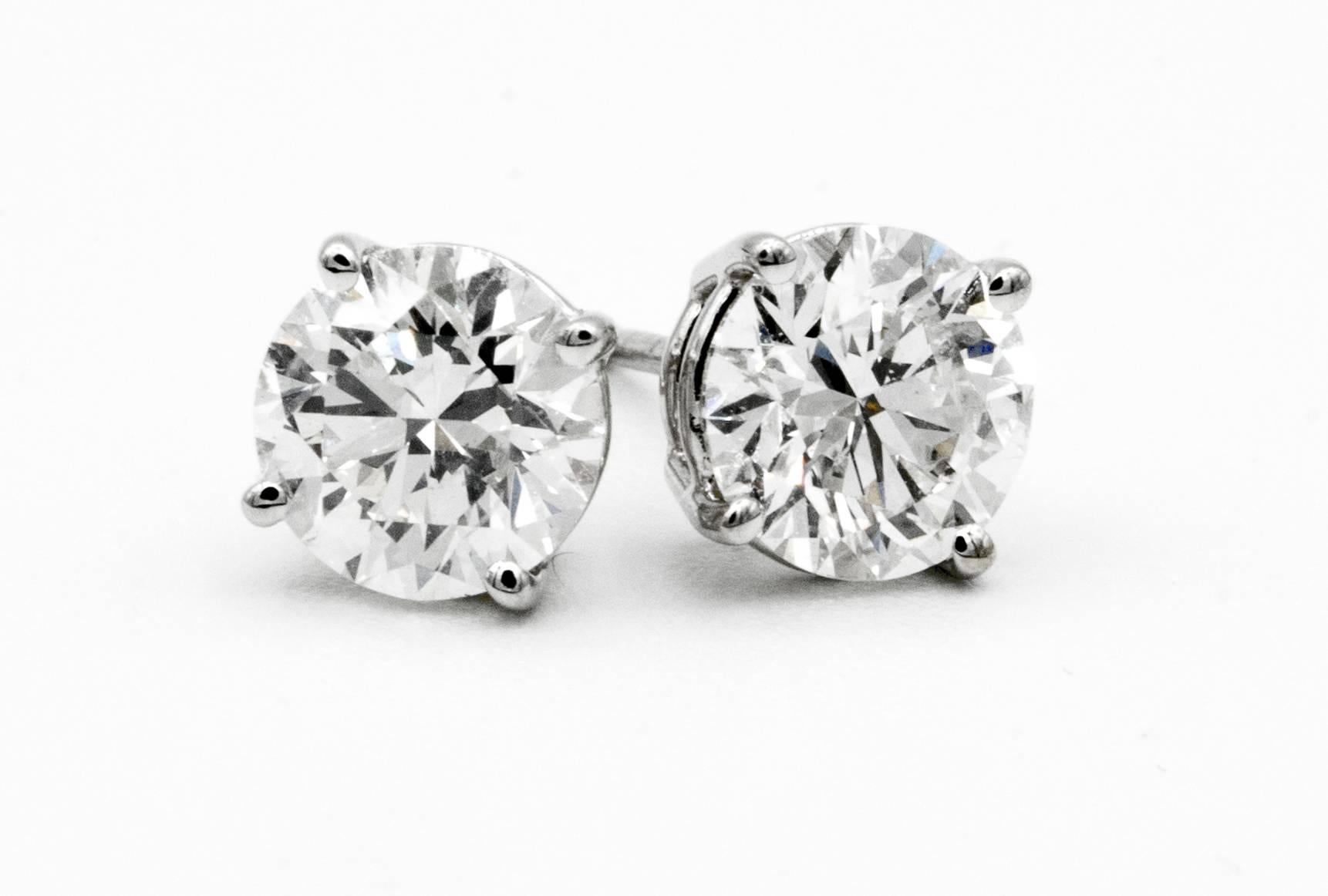 2.02 Carat Diamond Stud earrings in 14K White Gold
A pair of Diamond stud earrings weighing 2.02 Carats total. 
Color is H , Clarity is SI2
6.4 MM Diameter, beautifully cut and perfectly matched pair 
