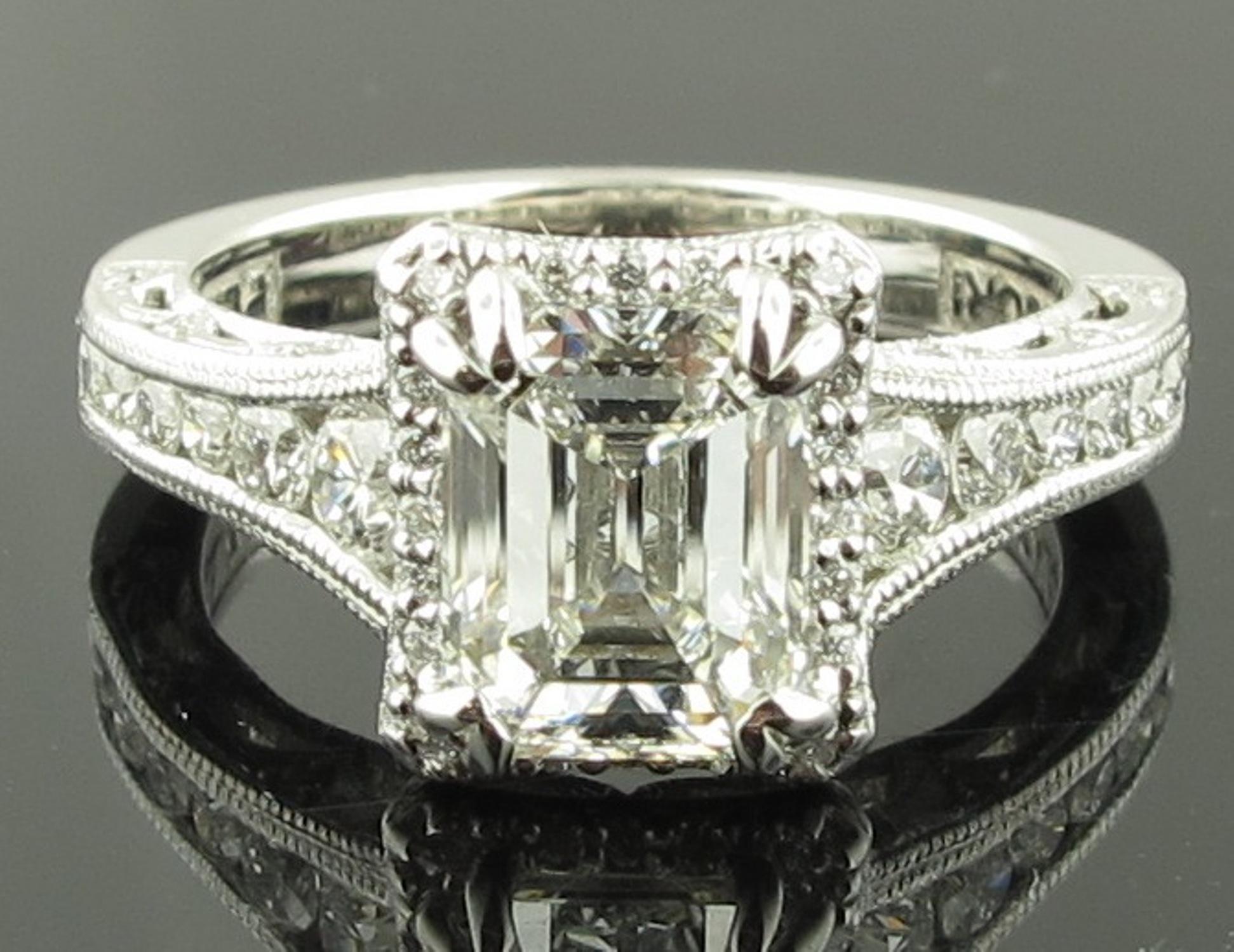 18 karat white gold Tacori Plat mounting with a 2.02 carat Emerald Cut diamond ring, GIA certified, F color, VS-1 clarity.  The mounting includes 48 round brilliant diamonds weighing 0.84 carats, E-F color, VVS clarity. Ring size: 6.25.