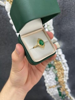 2.02 Carat Emerald Statement 18K White Gold A Classic Statement