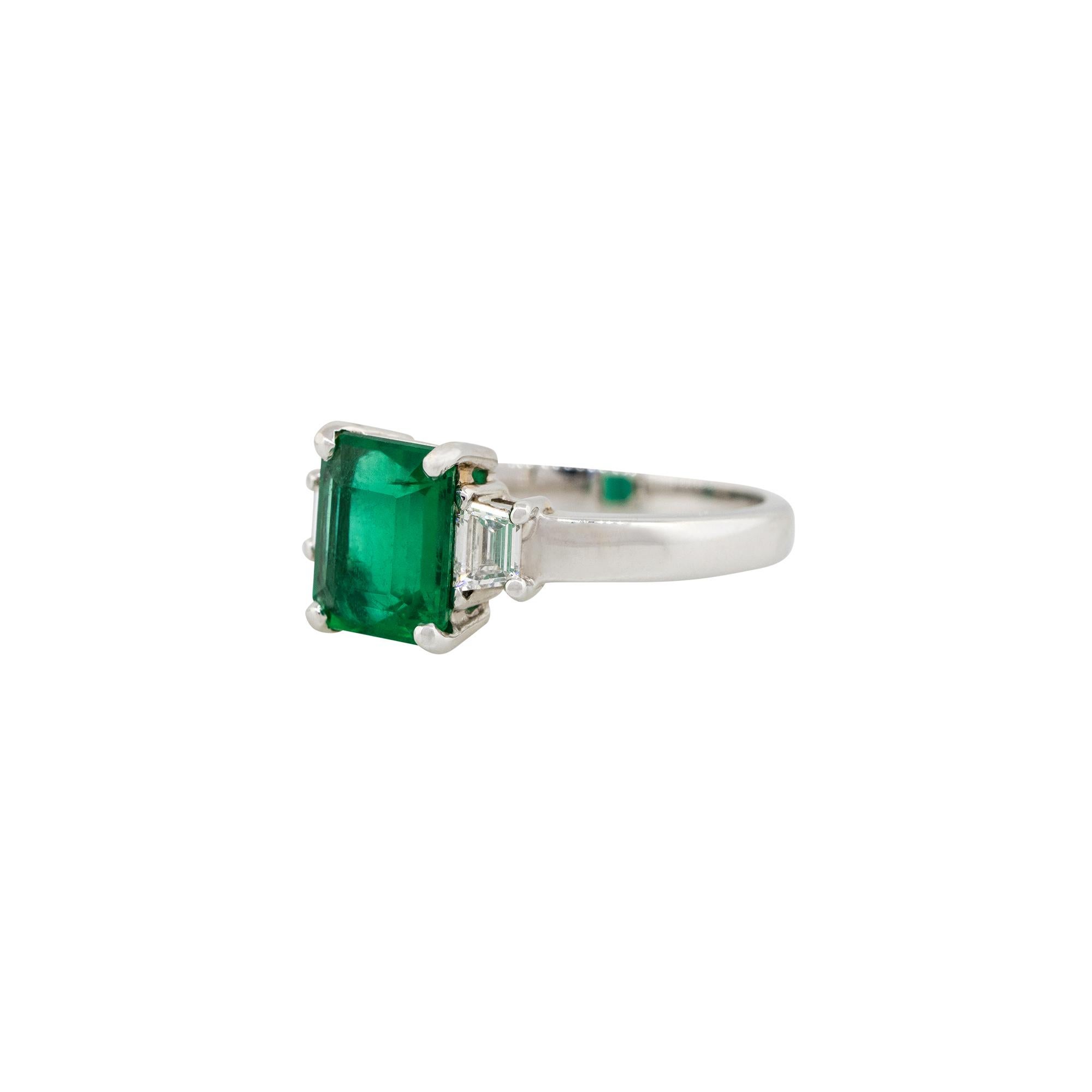 Material: 18k White Gold
Diamond details: Approx. 0.29ctw of trapezoid diamonds. Diamonds are G/H in color and VS in clarity
Gemstone details: Approx. 2.02ct emerald. Center: 8.9mm x 7.7mm
Ring Size: 7
Ring Measurements: 0.35