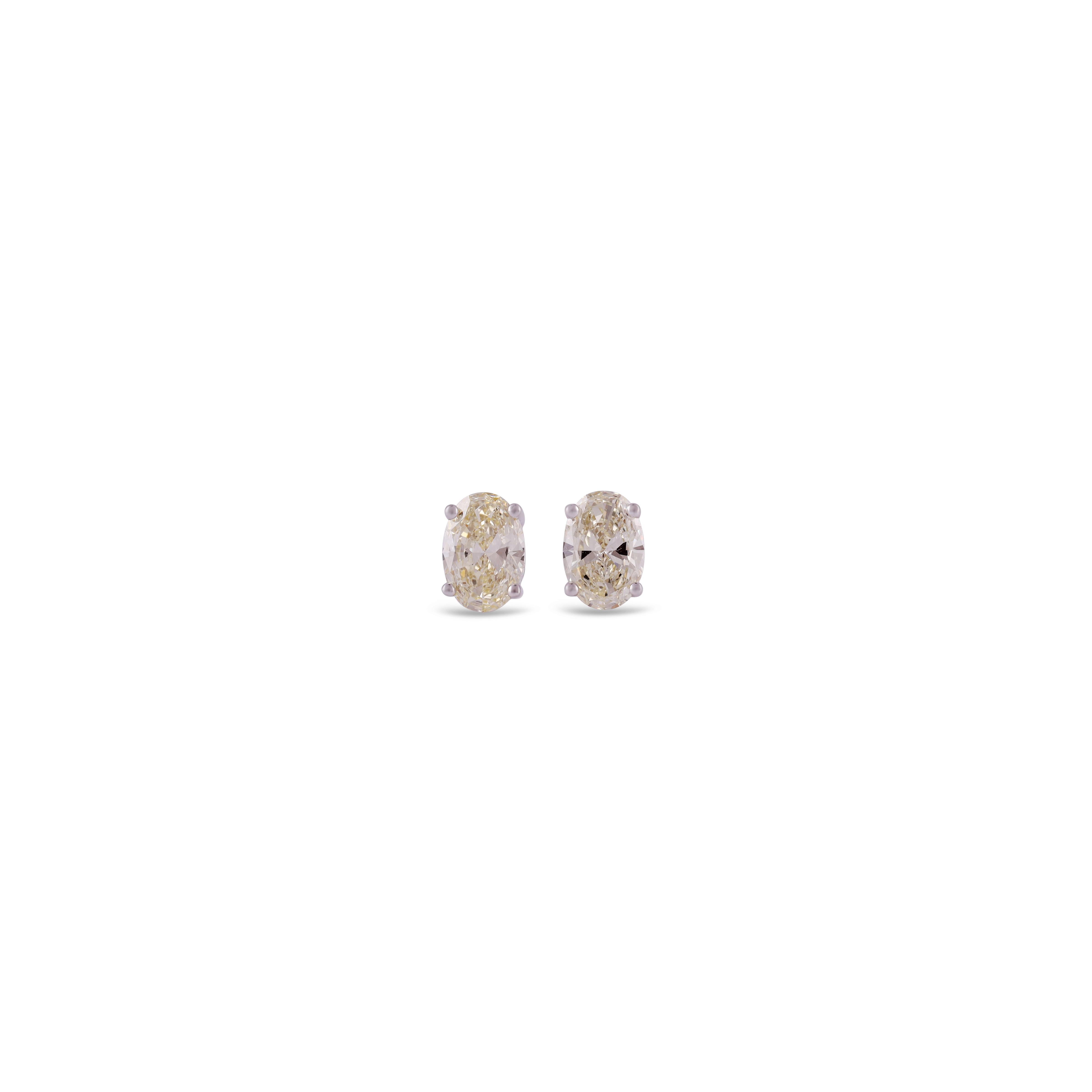 Oval Cut 2.02 Carat Fancy Solitaire Diamond Earring Studded in 18 Karat White Gold For Sale