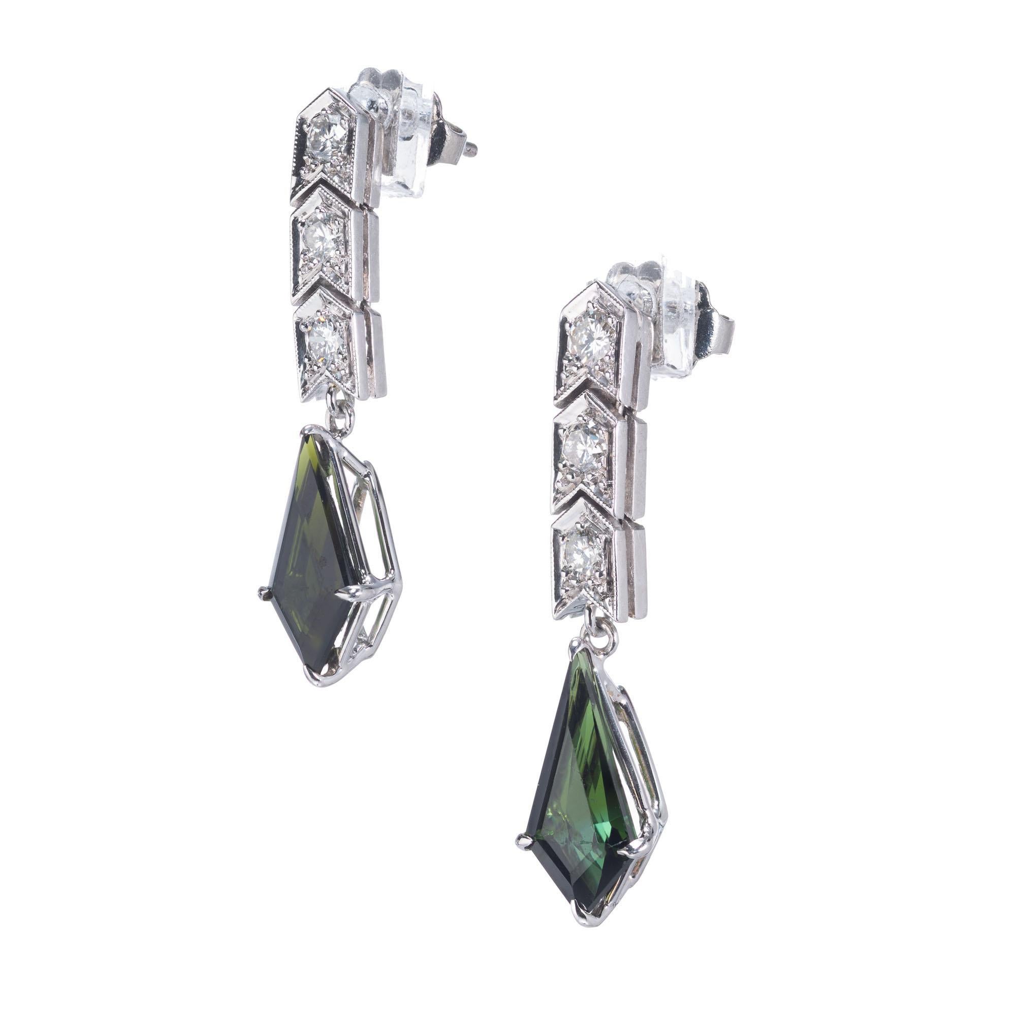 Art Deco tourmaline and diamond dangle earrings circa 1920's. Hinged chevron sections with bright full cut diamonds with two kite shaped green Tourmaline dangles in platinum. 

2 kite shaped bright green Tourmaline, approx. total weight 2.02cts, VS,